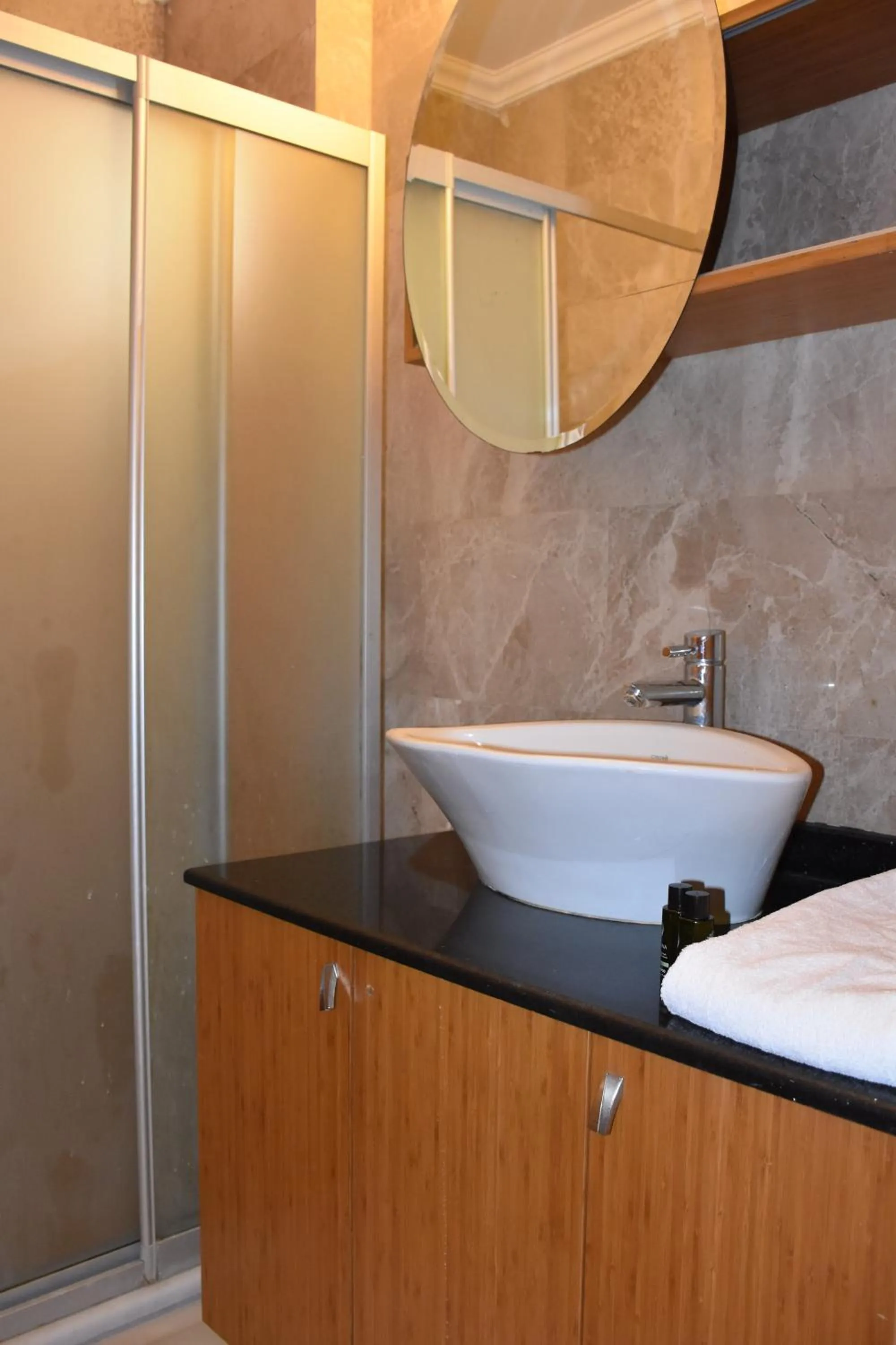 Bathroom in Dinara Apart Hotel