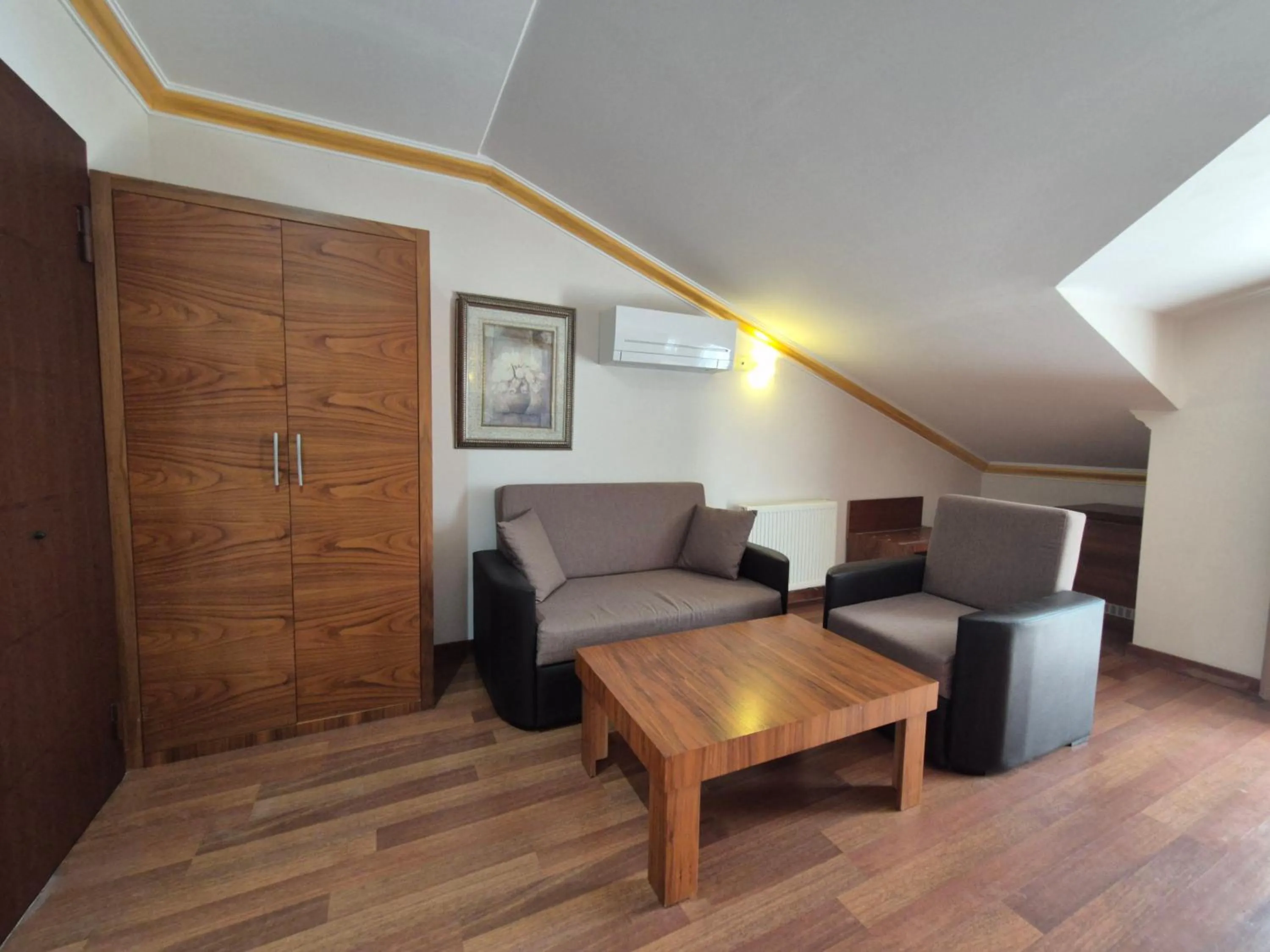 Seating area in Dinara Apart Hotel