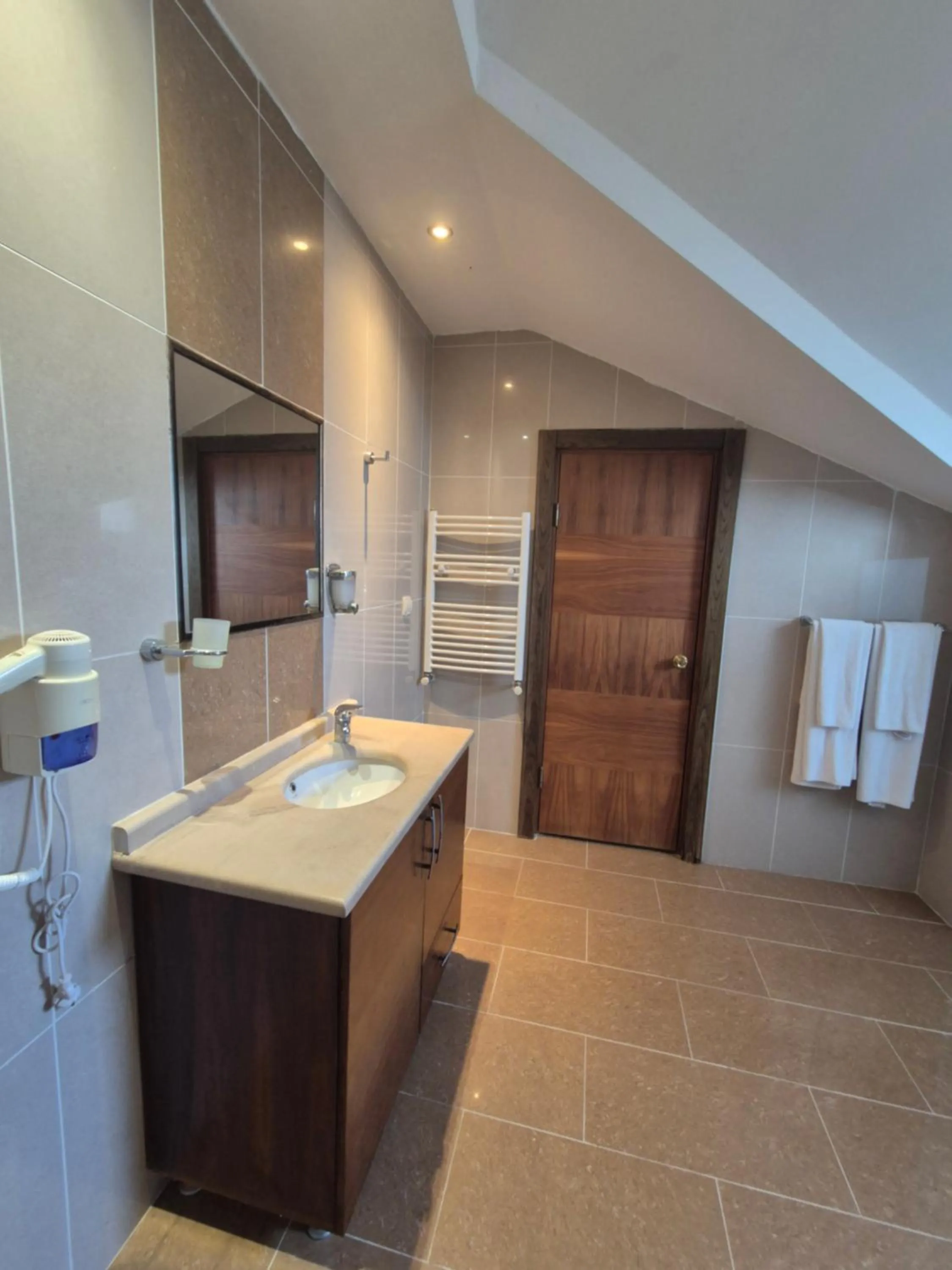 Bathroom in Dinara Apart Hotel