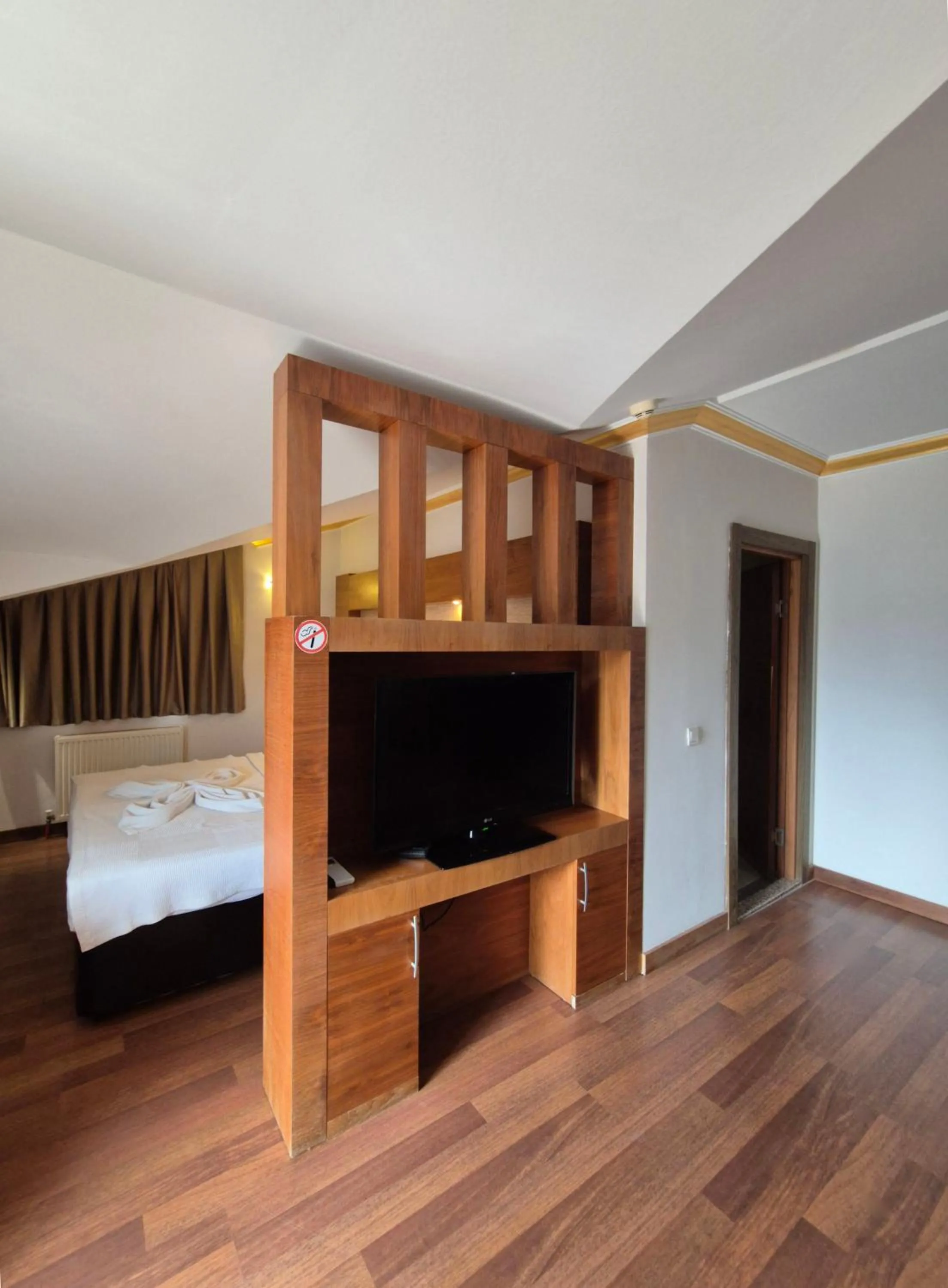 Bed in Dinara Apart Hotel