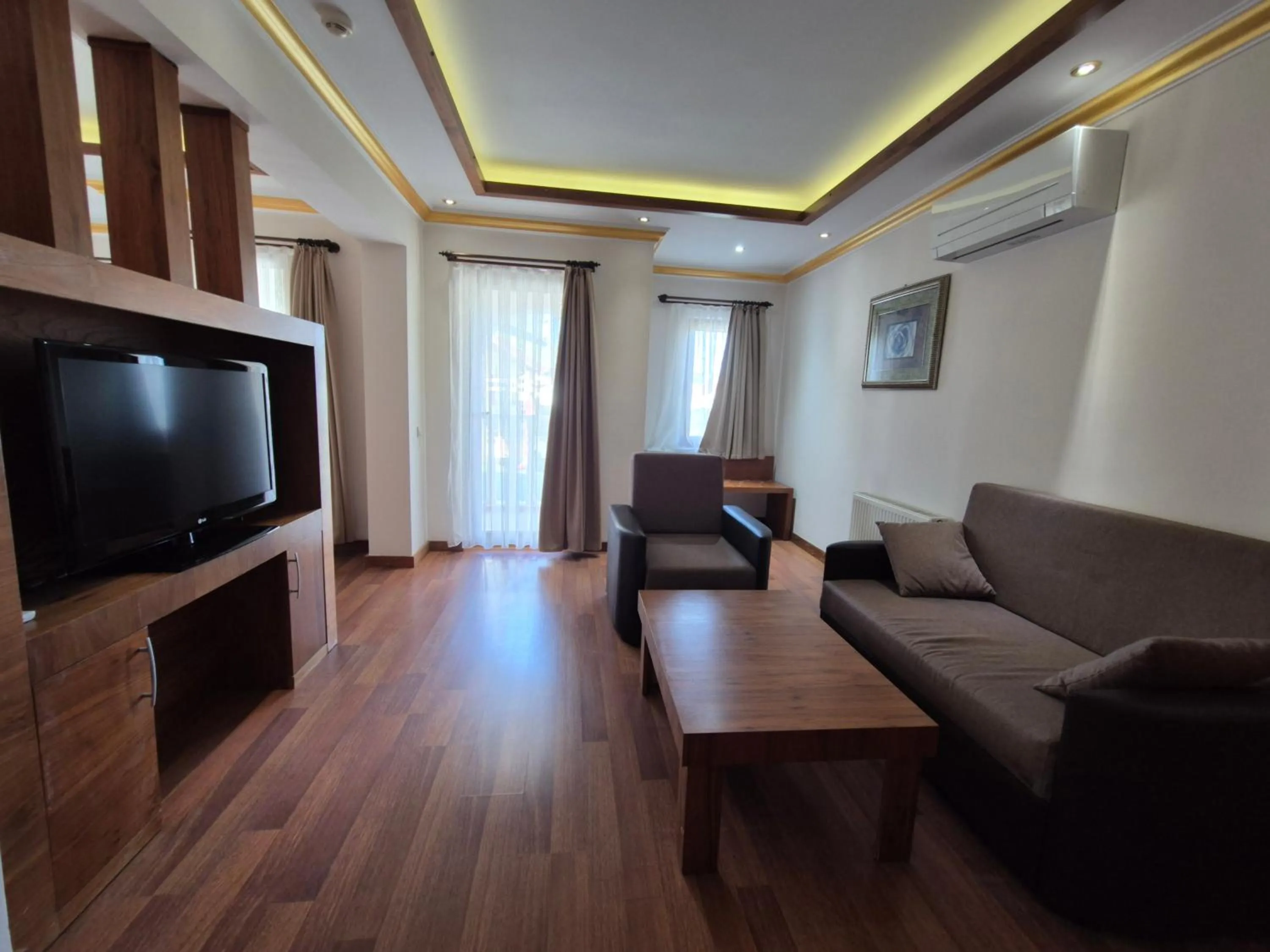 TV and multimedia in Dinara Apart Hotel