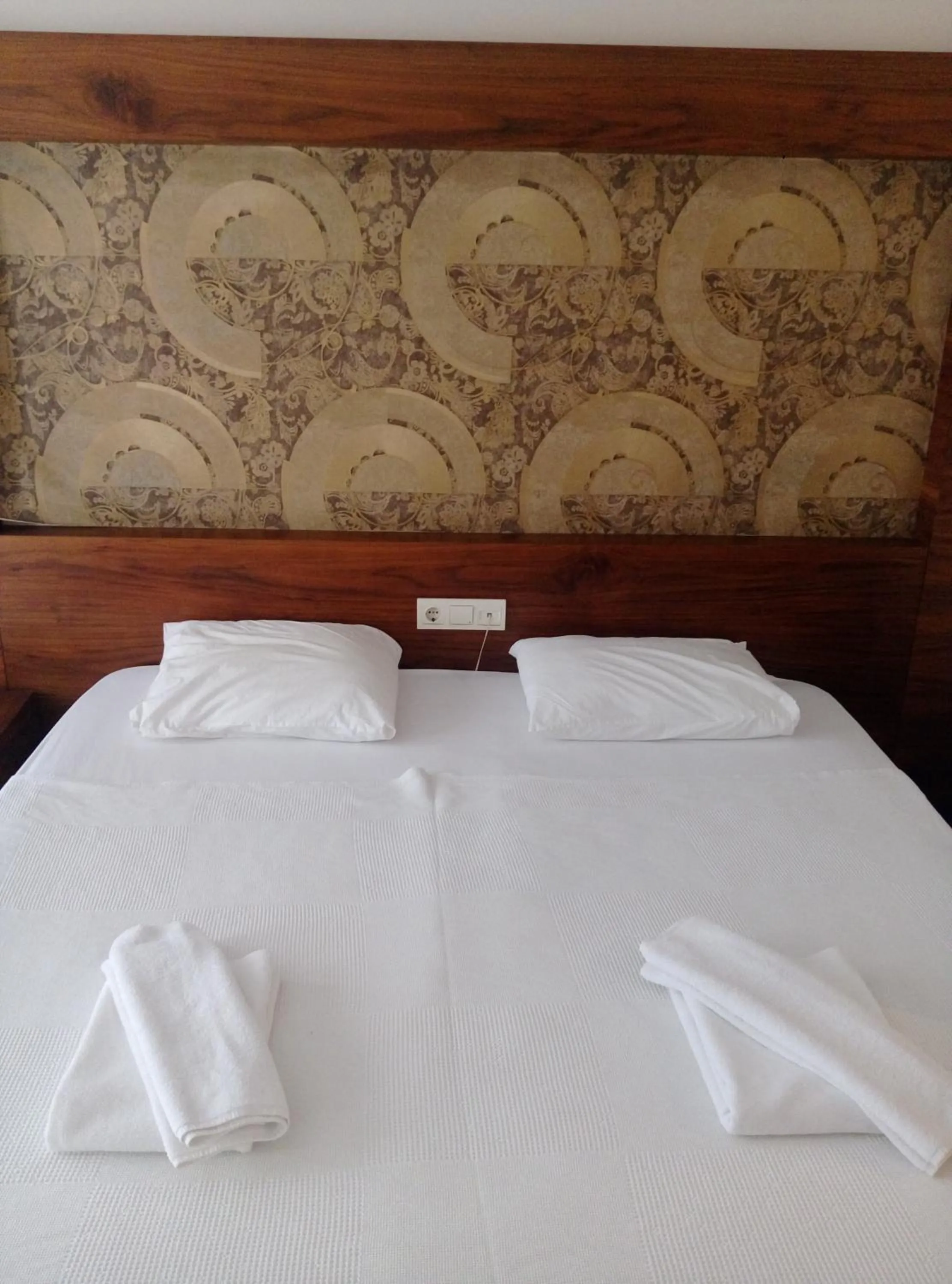 Bed in Dinara Apart Hotel