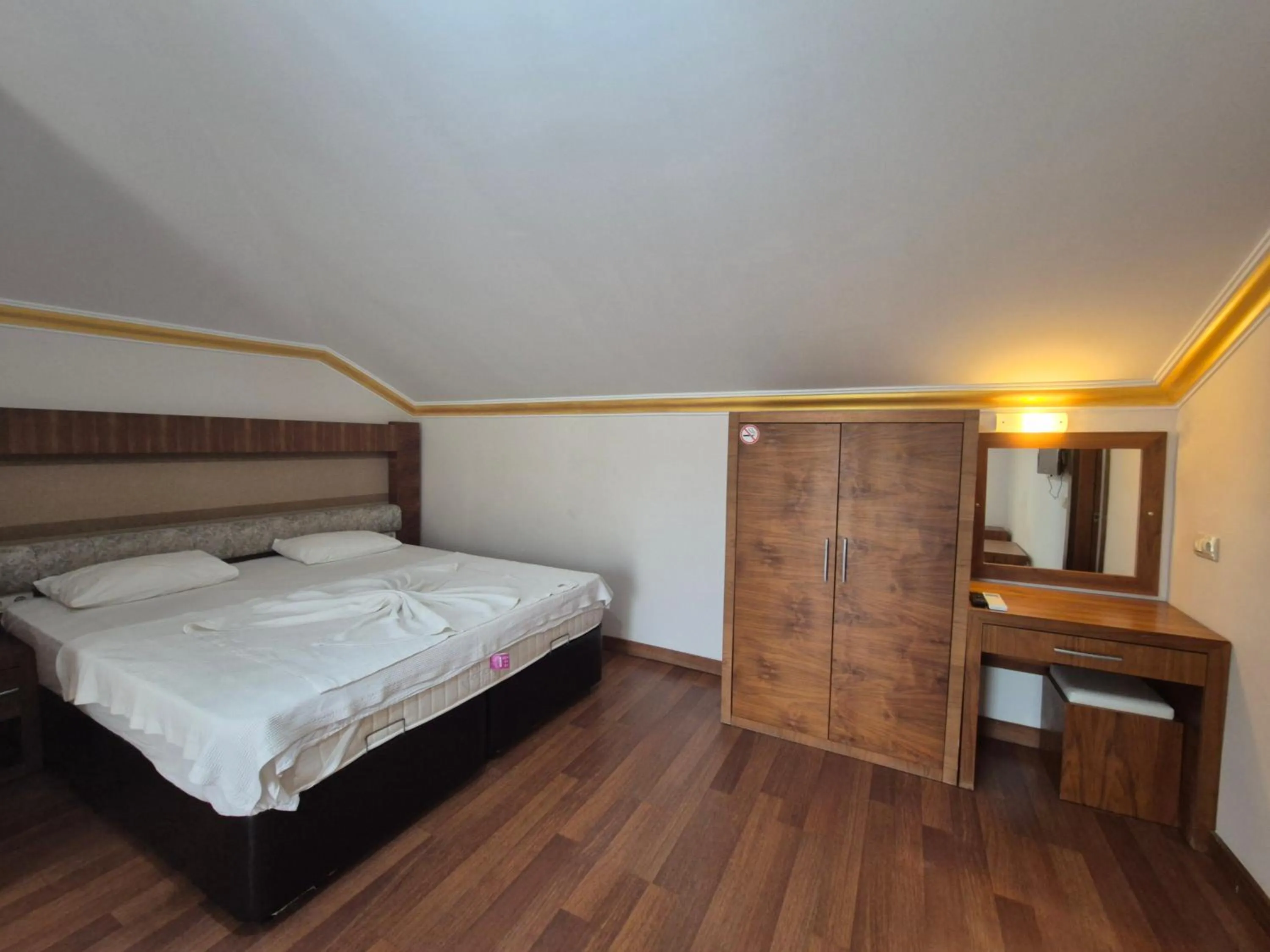 Bed in Dinara Apart Hotel