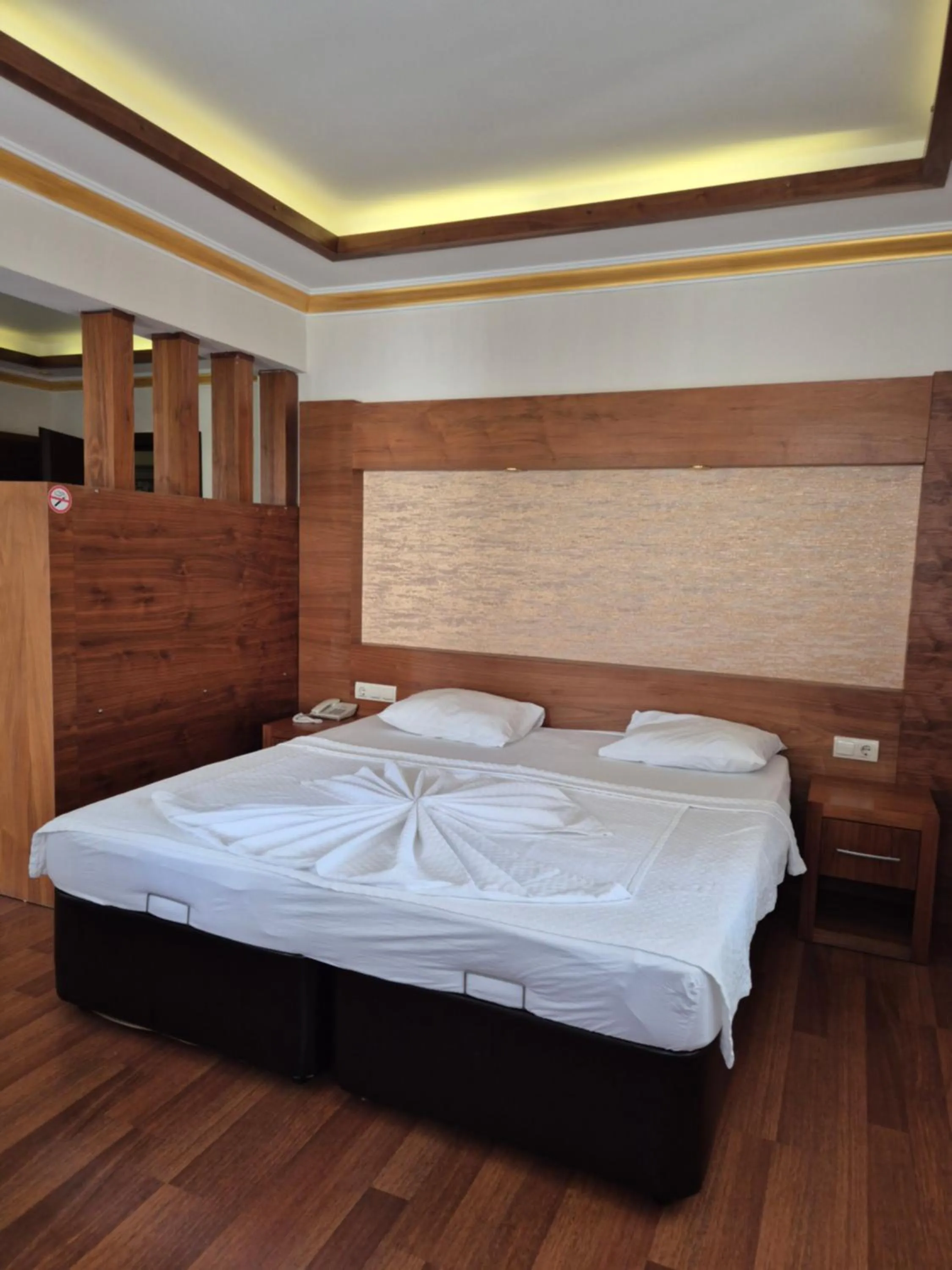 Bed in Dinara Apart Hotel