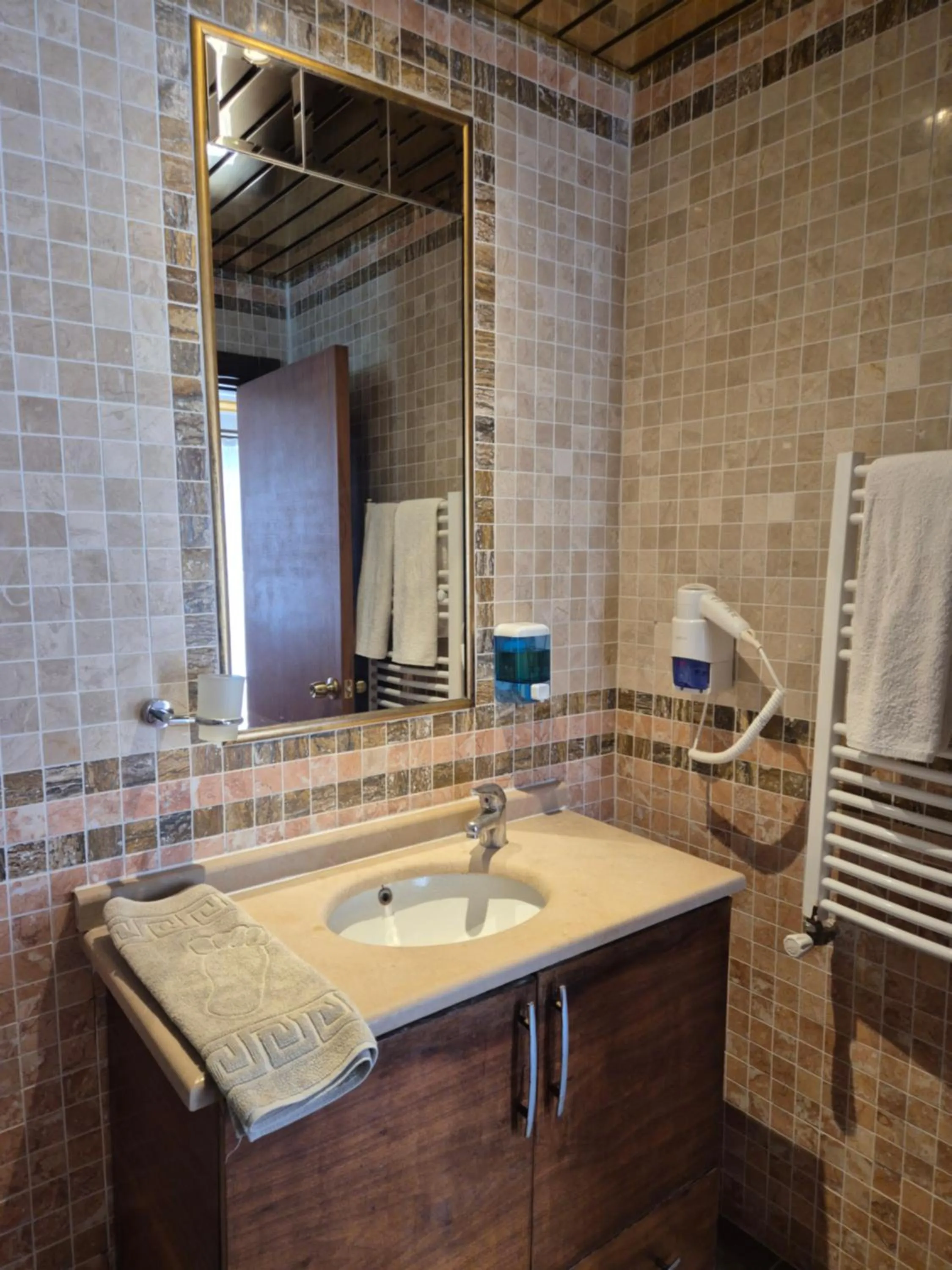 Bathroom in Dinara Apart Hotel