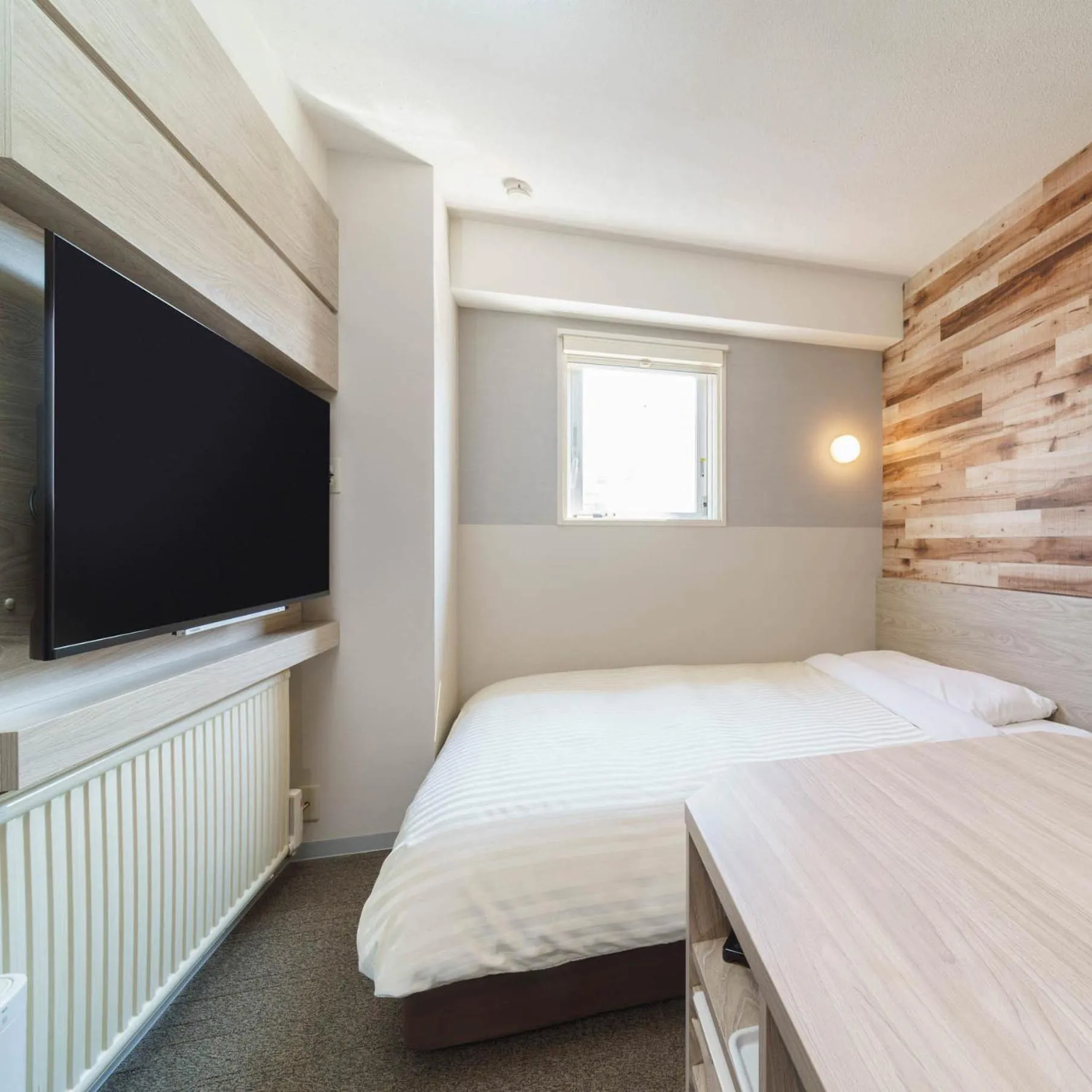 Bed in Super Hotel Kushiro Kurogane