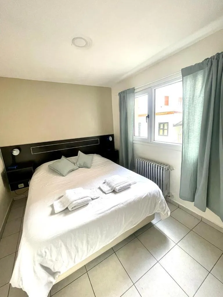 Bed in Antu Mahuida Apartments