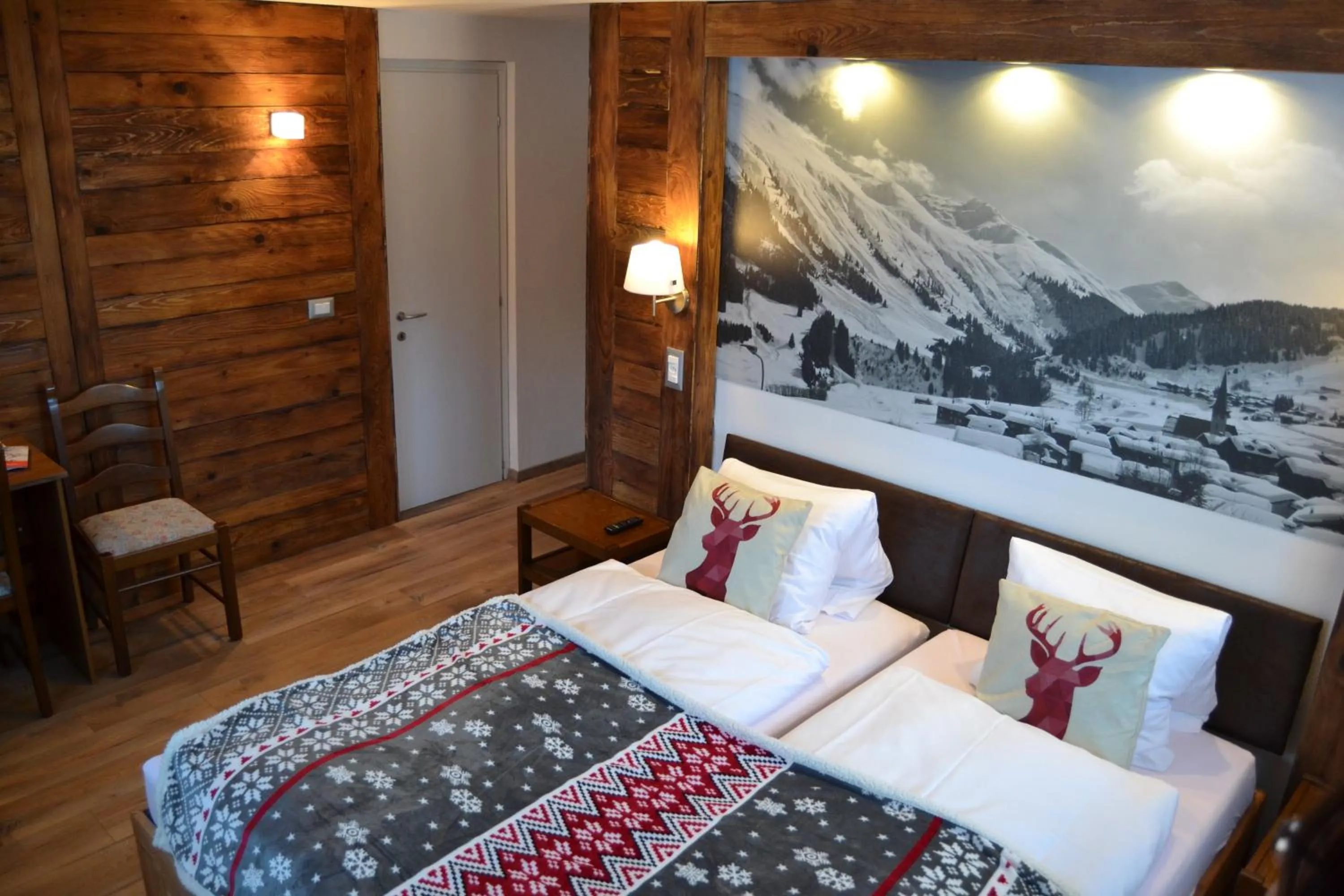 Photo of the whole room, Bed in Mountain Lodge Sedrun