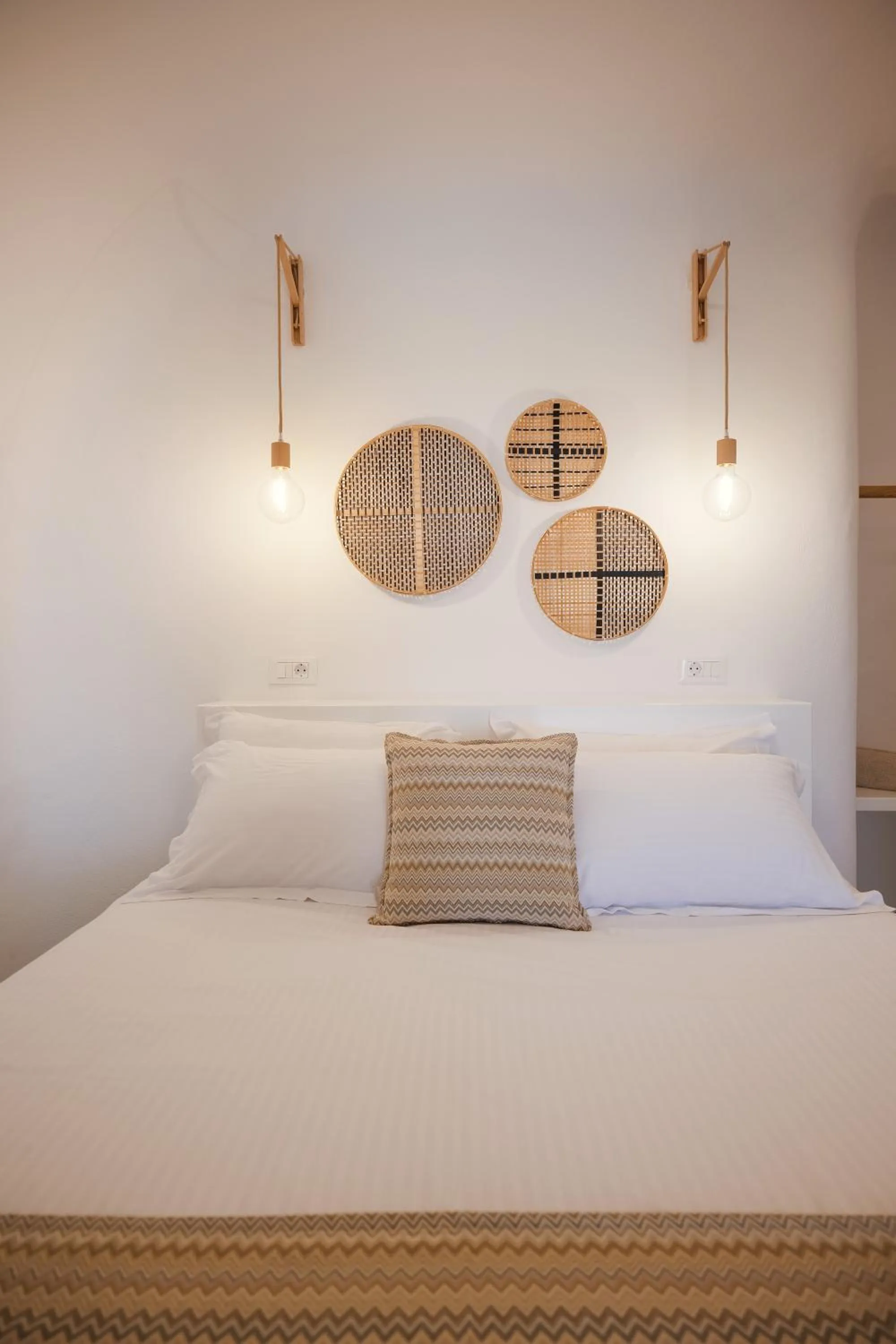 Bed in Valery Suites