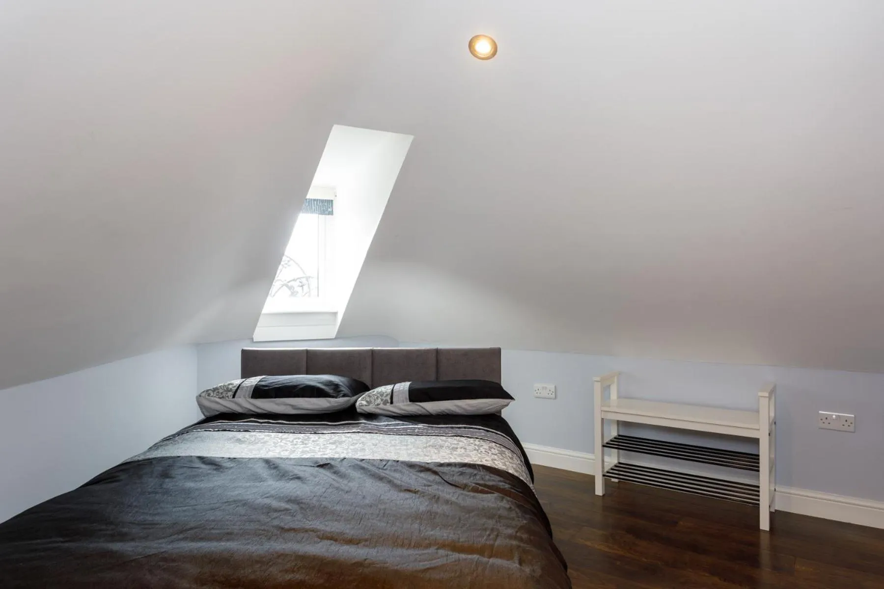 Bed in Molloys Apartments