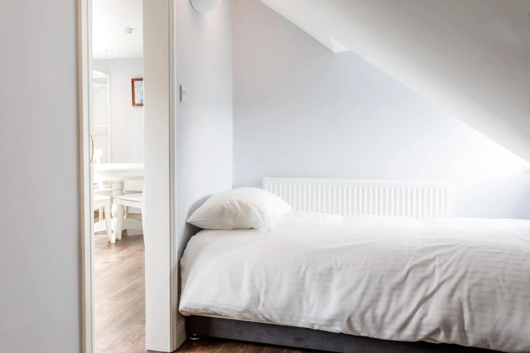 Bed in Molloys Apartments