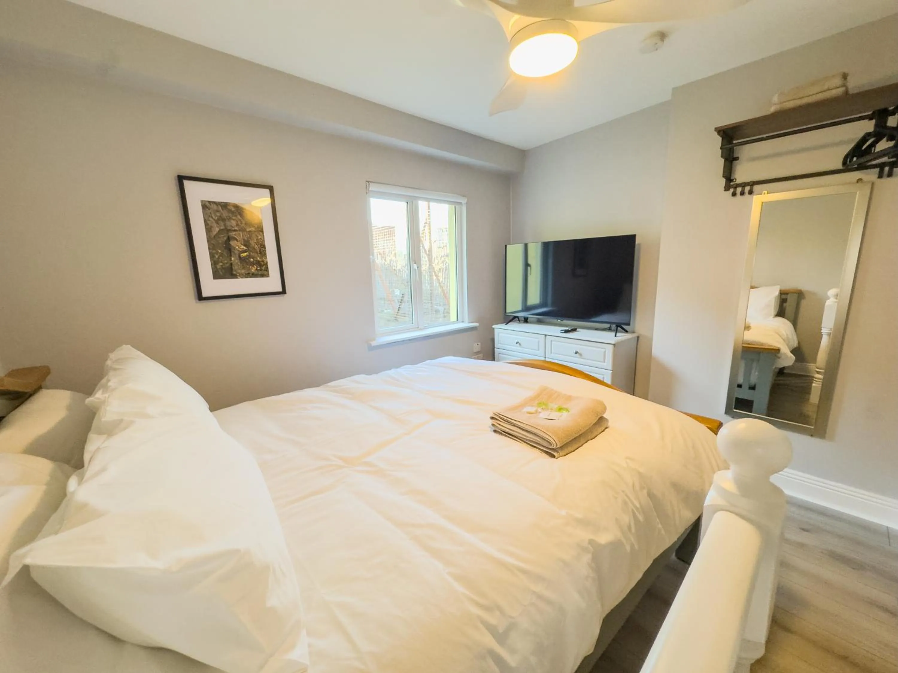 Bed in Molloys Apartments