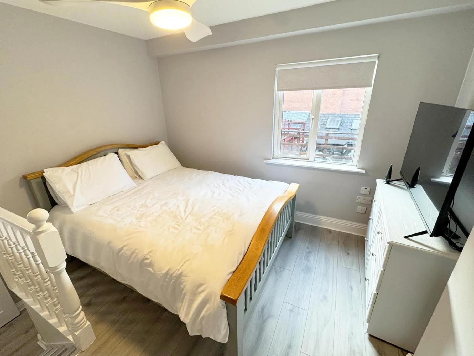 Bed in Molloys Apartments