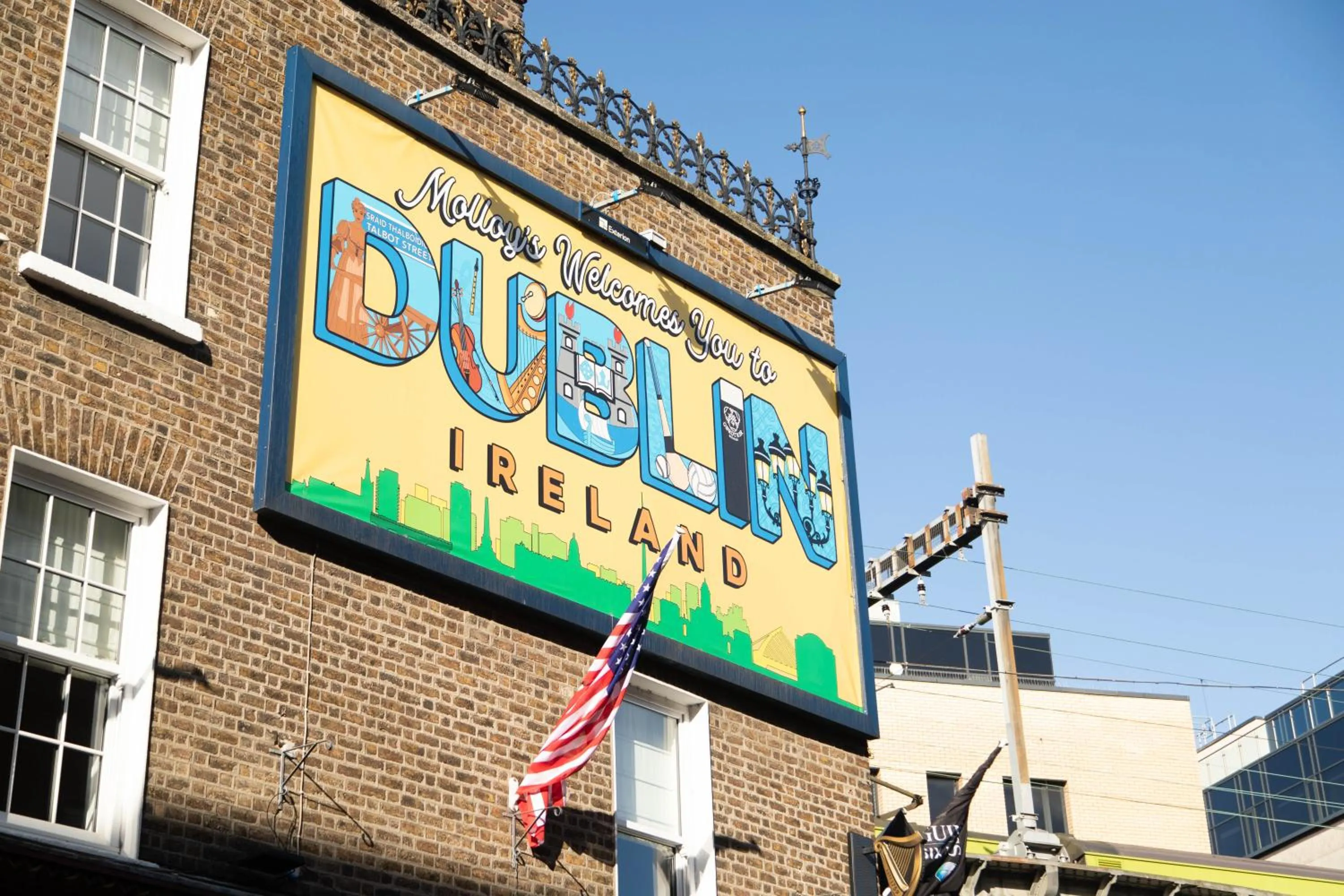 Property logo or sign in Molloys Apartments