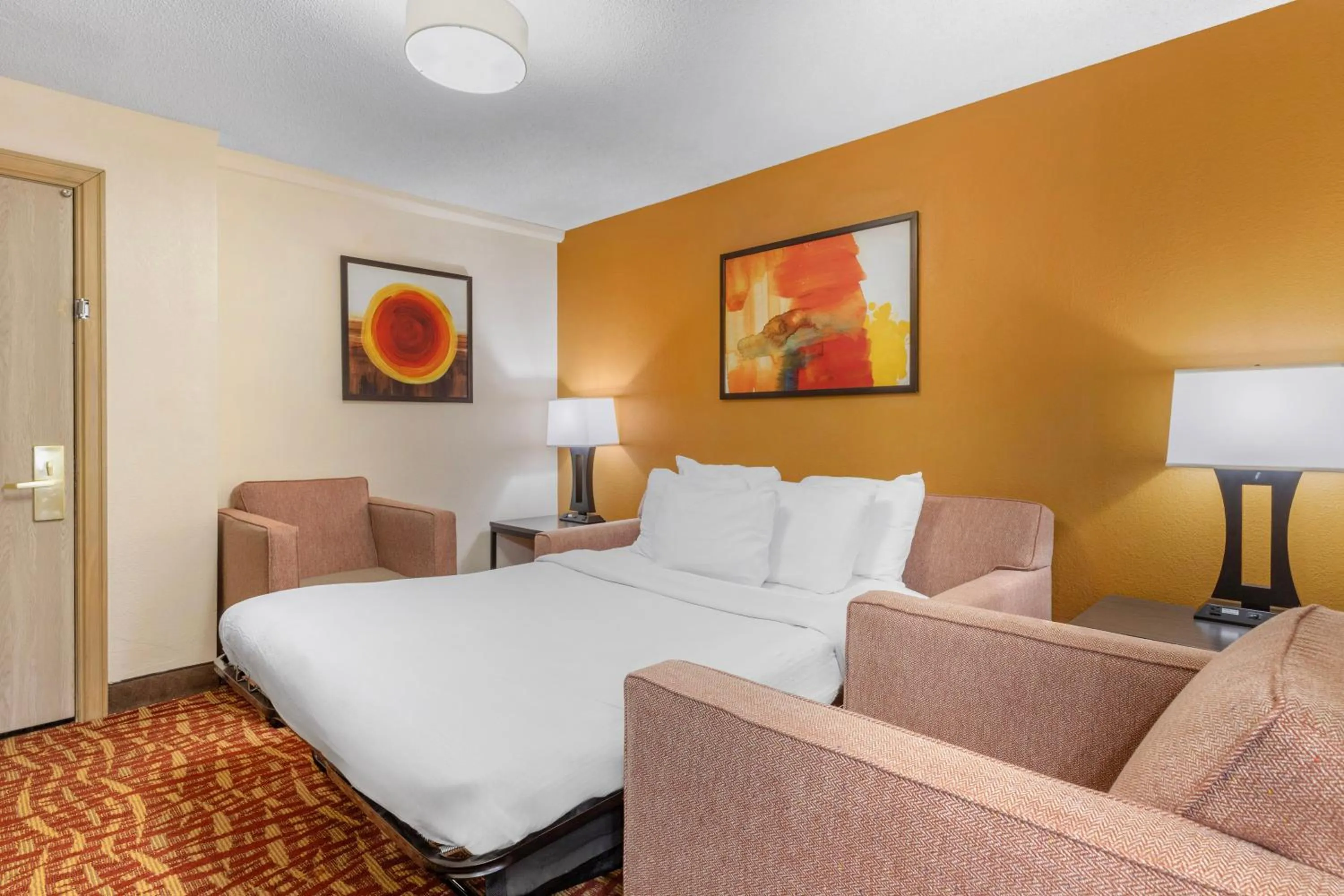 Living room, Bed in Best Western Aspen Hotel