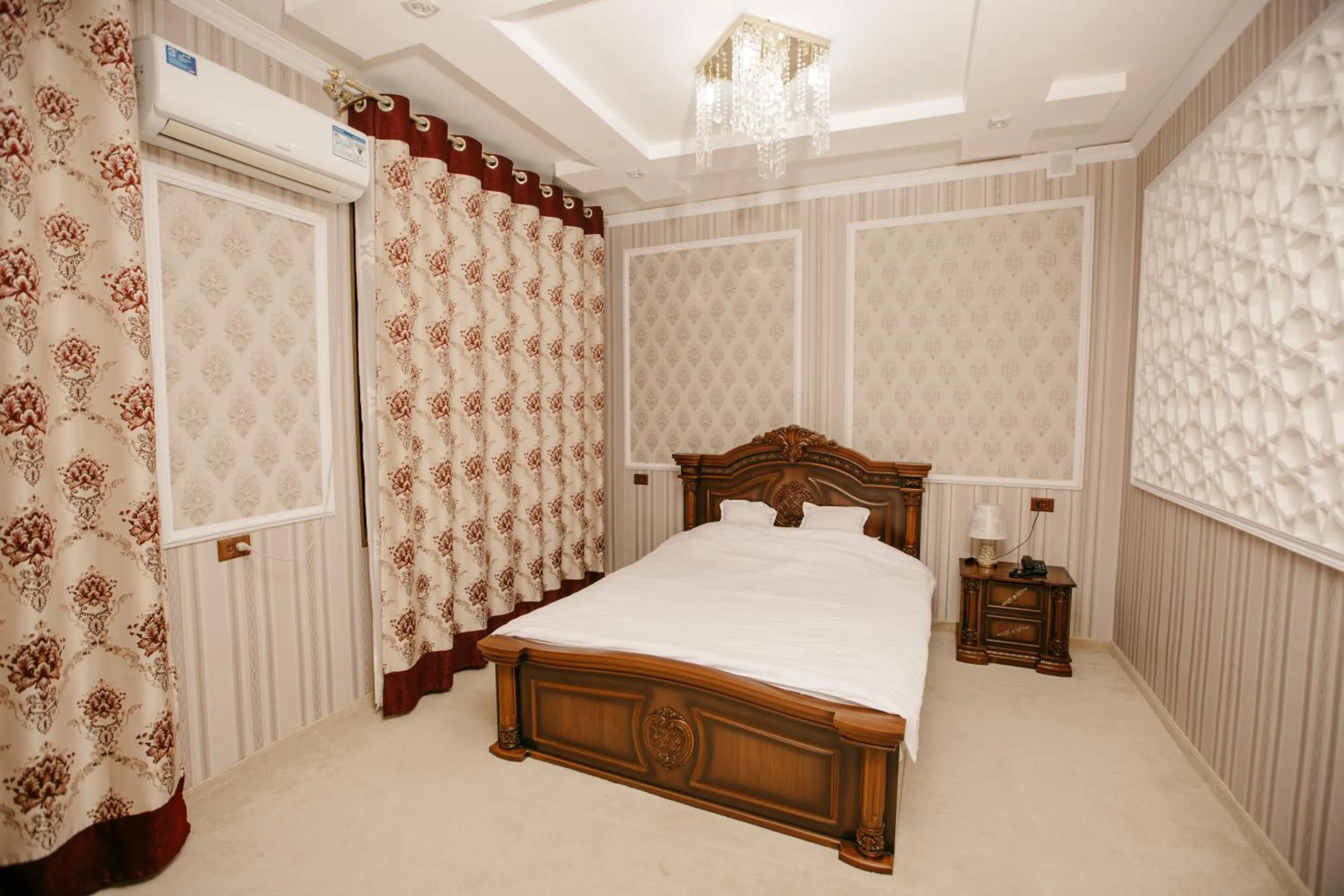 Bed in Hotel KARAVAN