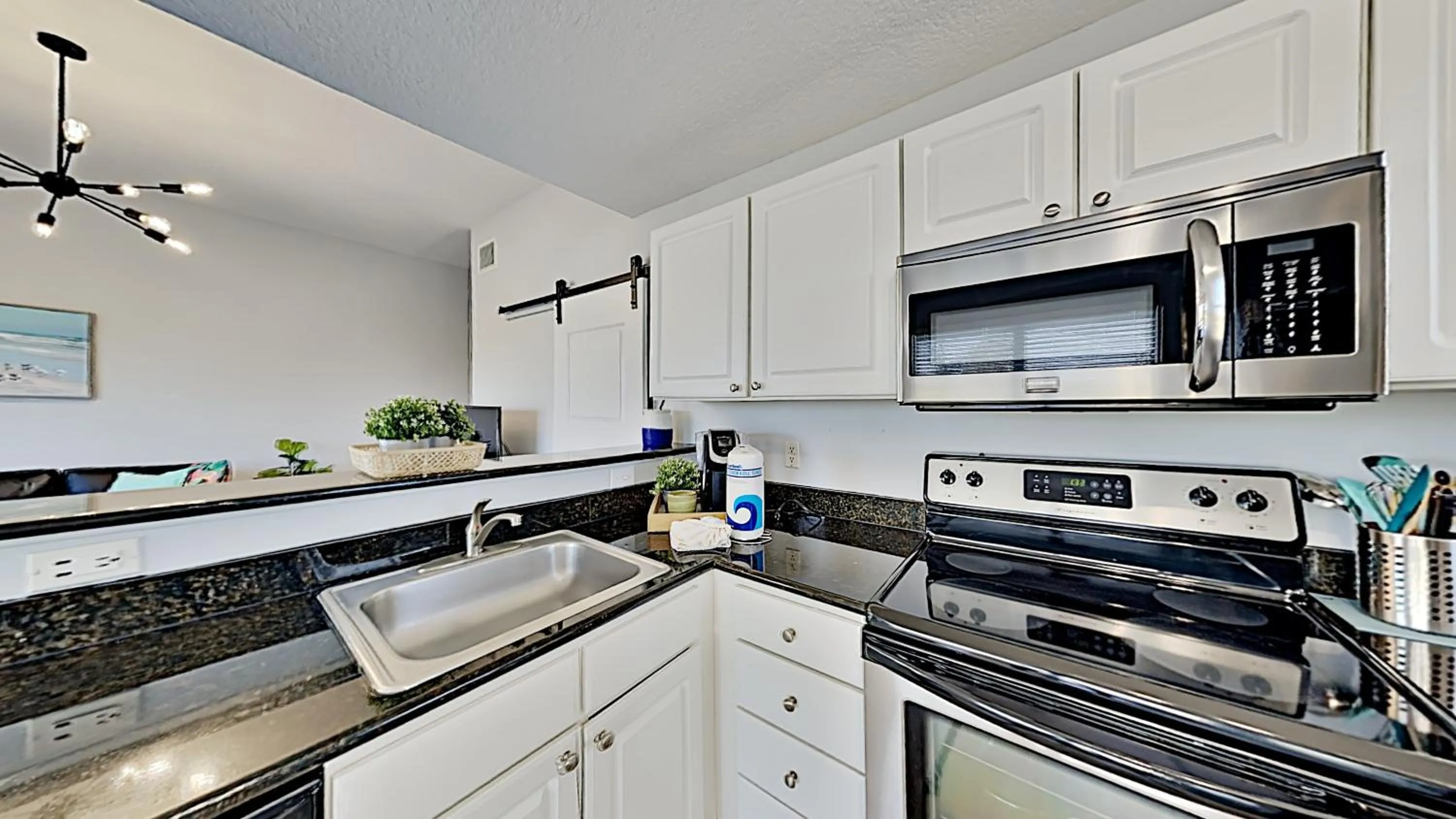 Kitchen or kitchenette in Madeira Bay Resort II by Travel Resort Services