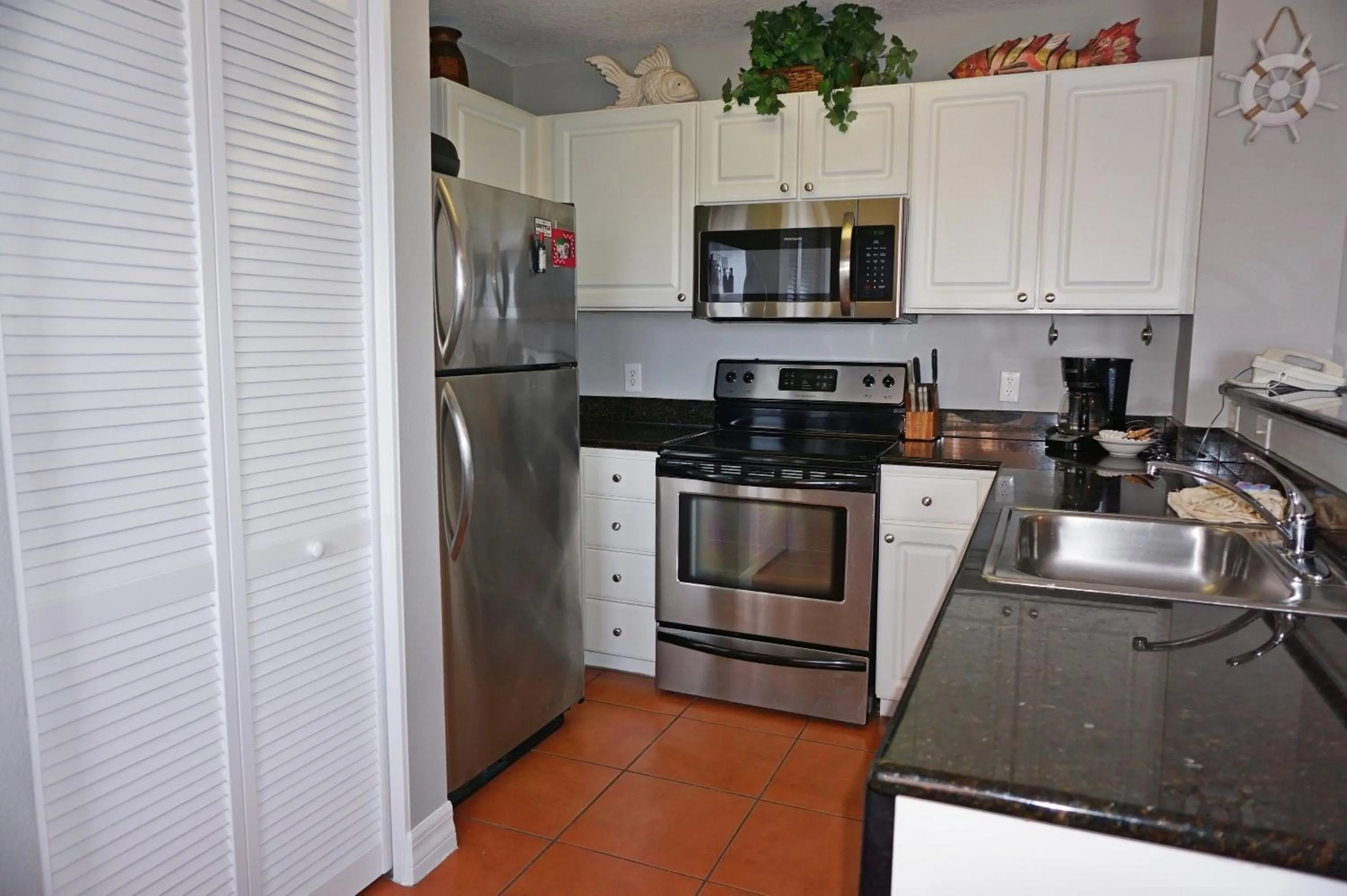 Kitchen or kitchenette in Madeira Bay Resort II by Travel Resort Services