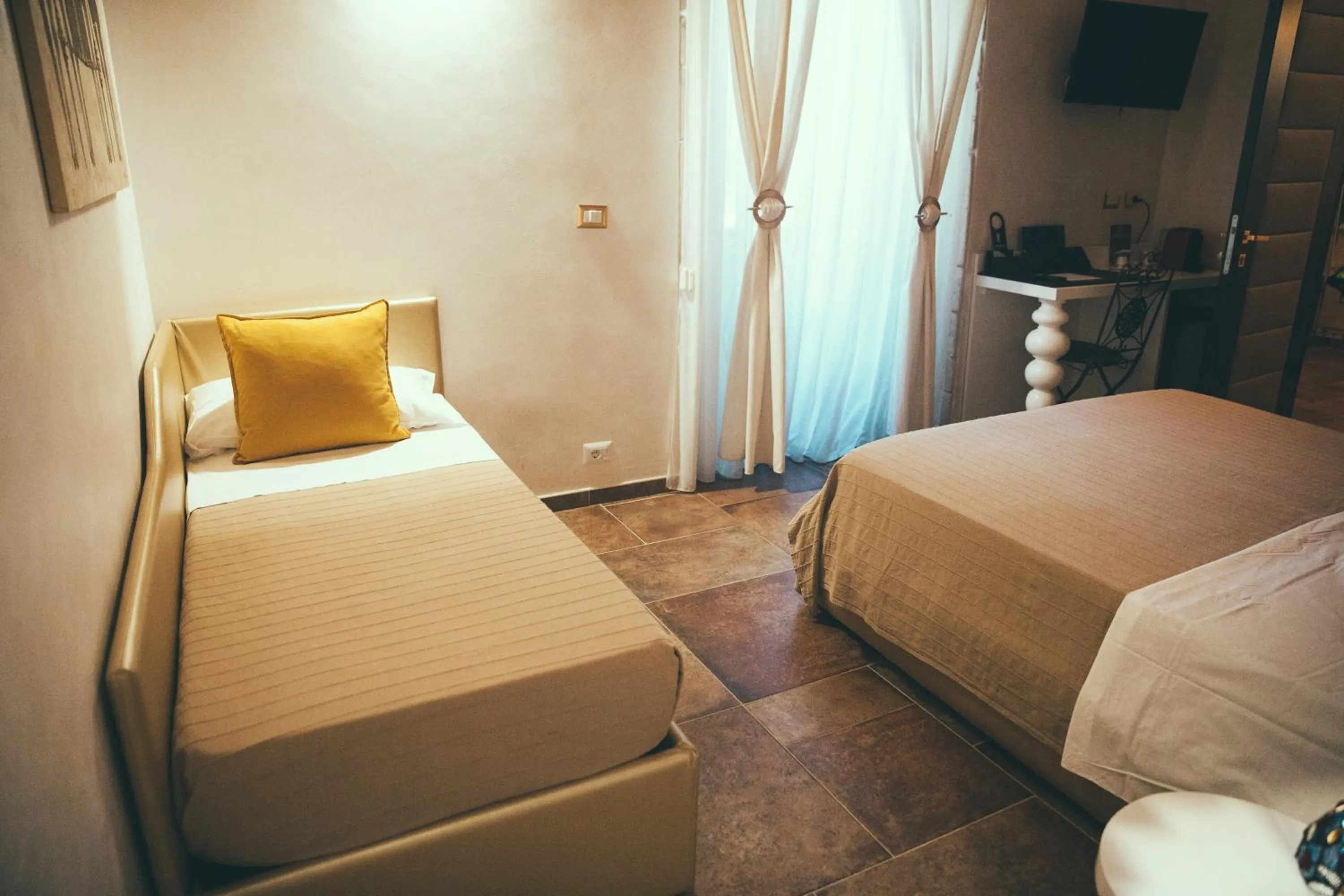 Bed in Lighthouse Suites Trastevere