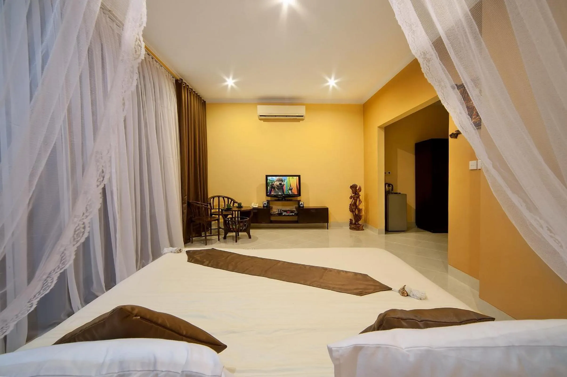 Bed in Rossa Garden Hotel