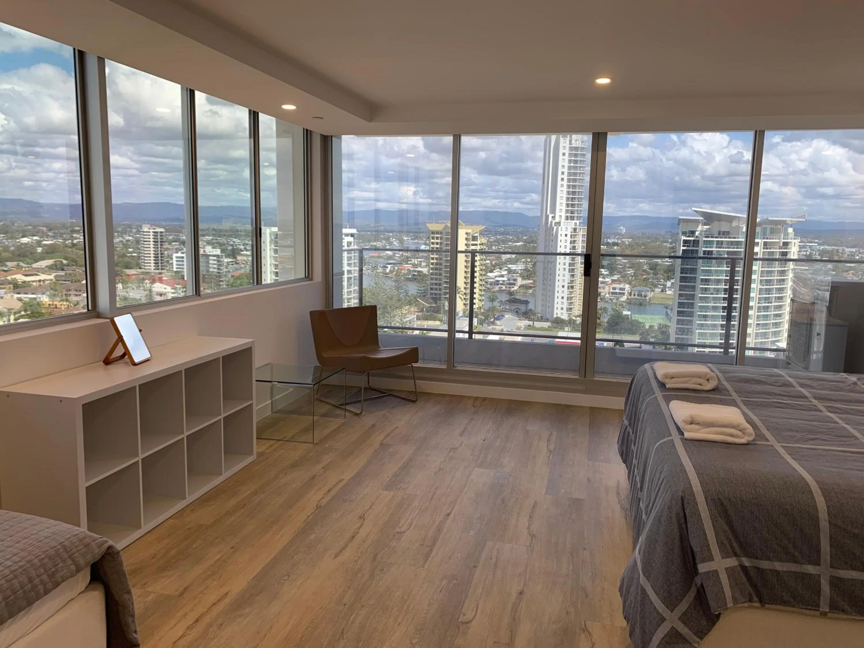 Bed in The Penthouses Apartments