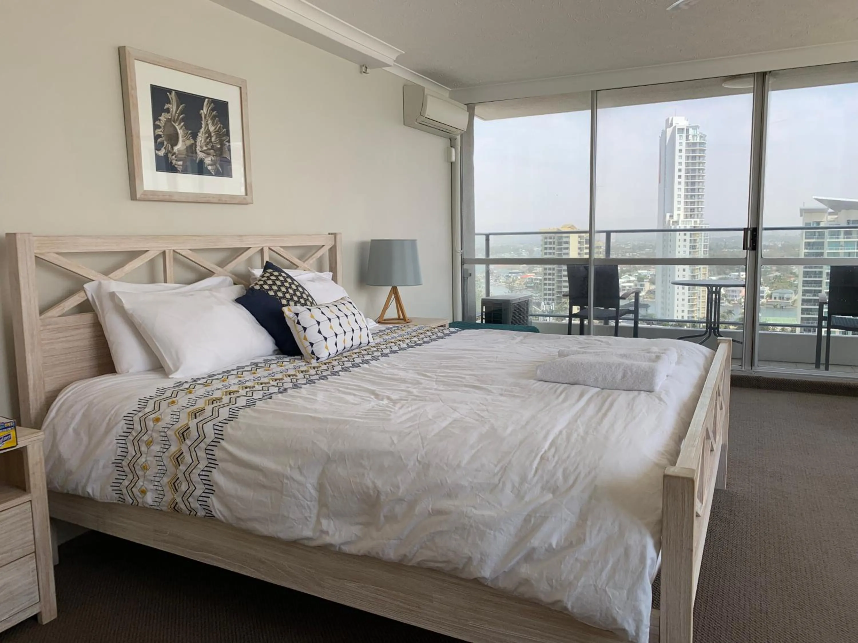 Bed in The Penthouses Apartments