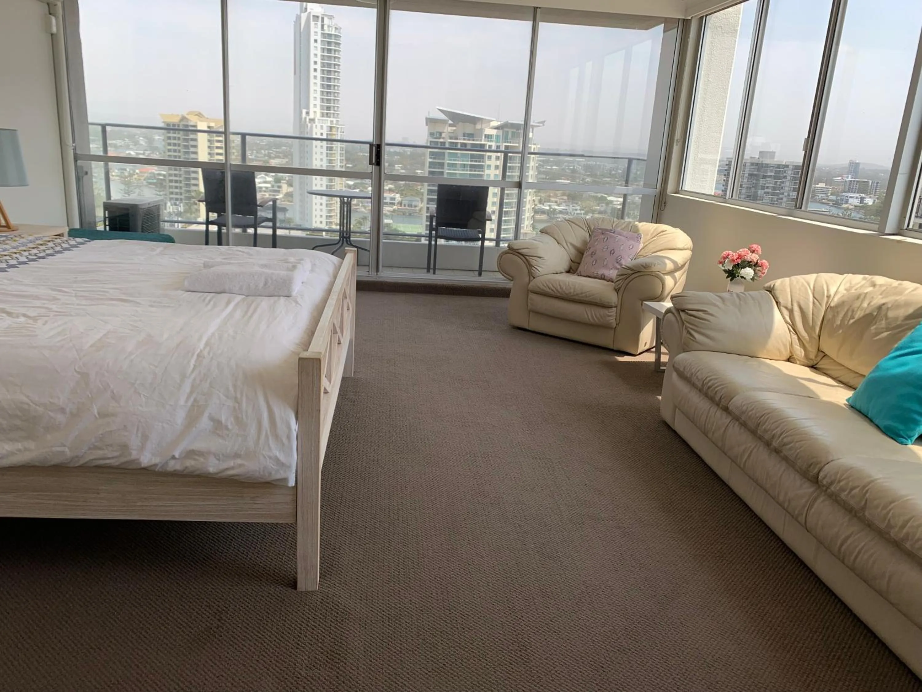 Bed in The Penthouses Apartments