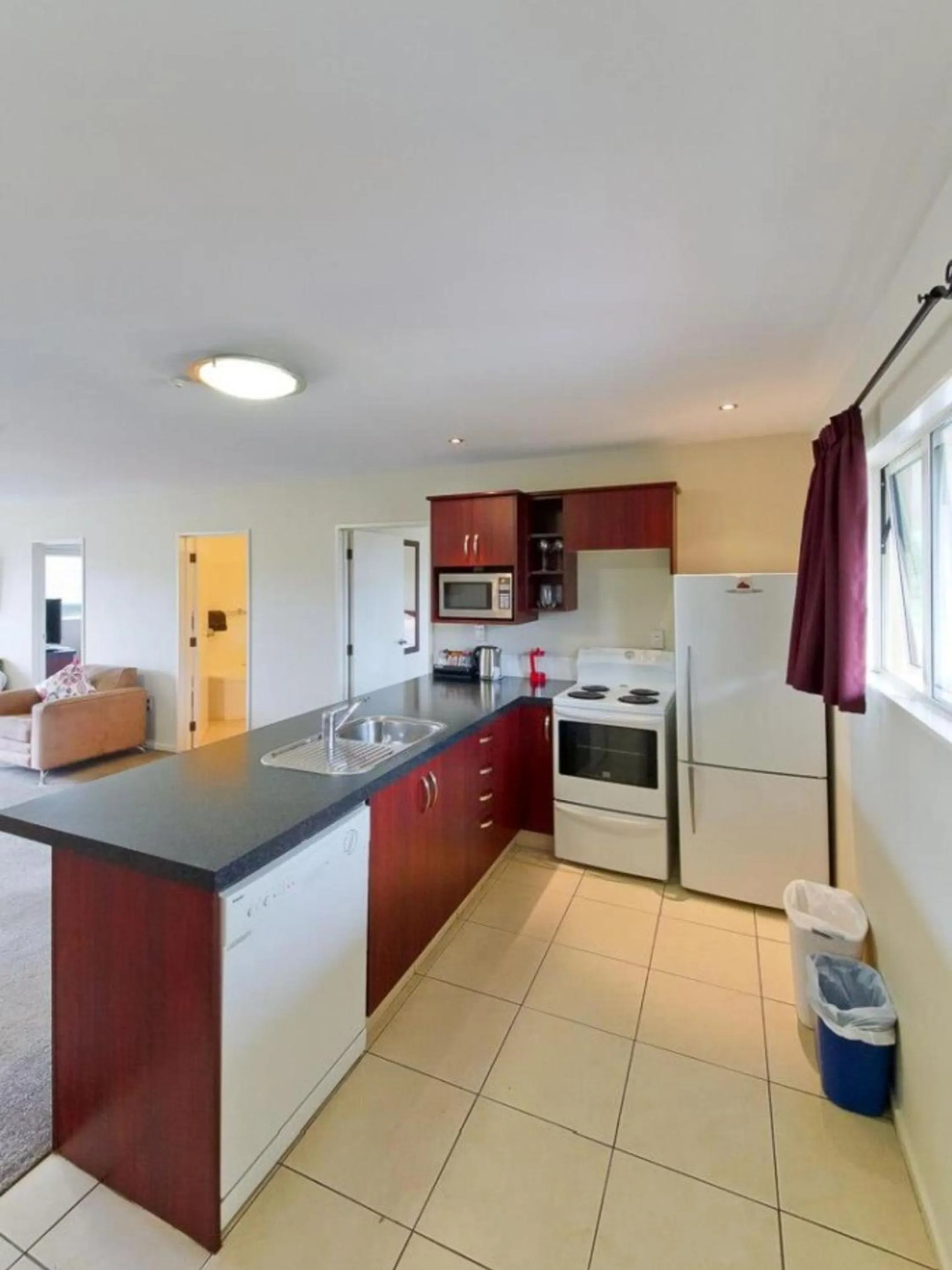 Kitchen or kitchenette in ASURE Avenue Motor Lodge