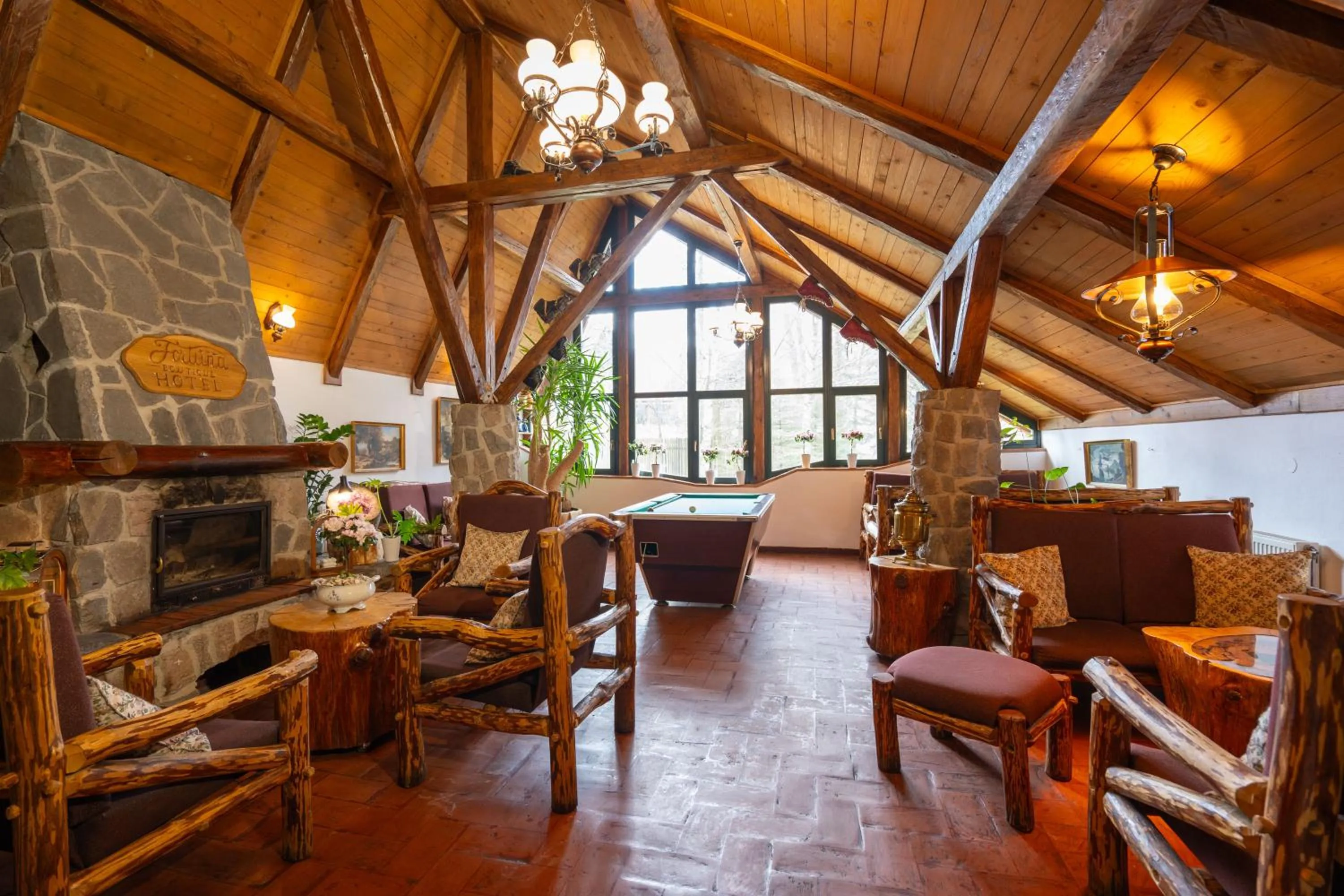 Communal lounge/ TV room in Fortuna Eco - Boutique Hotel