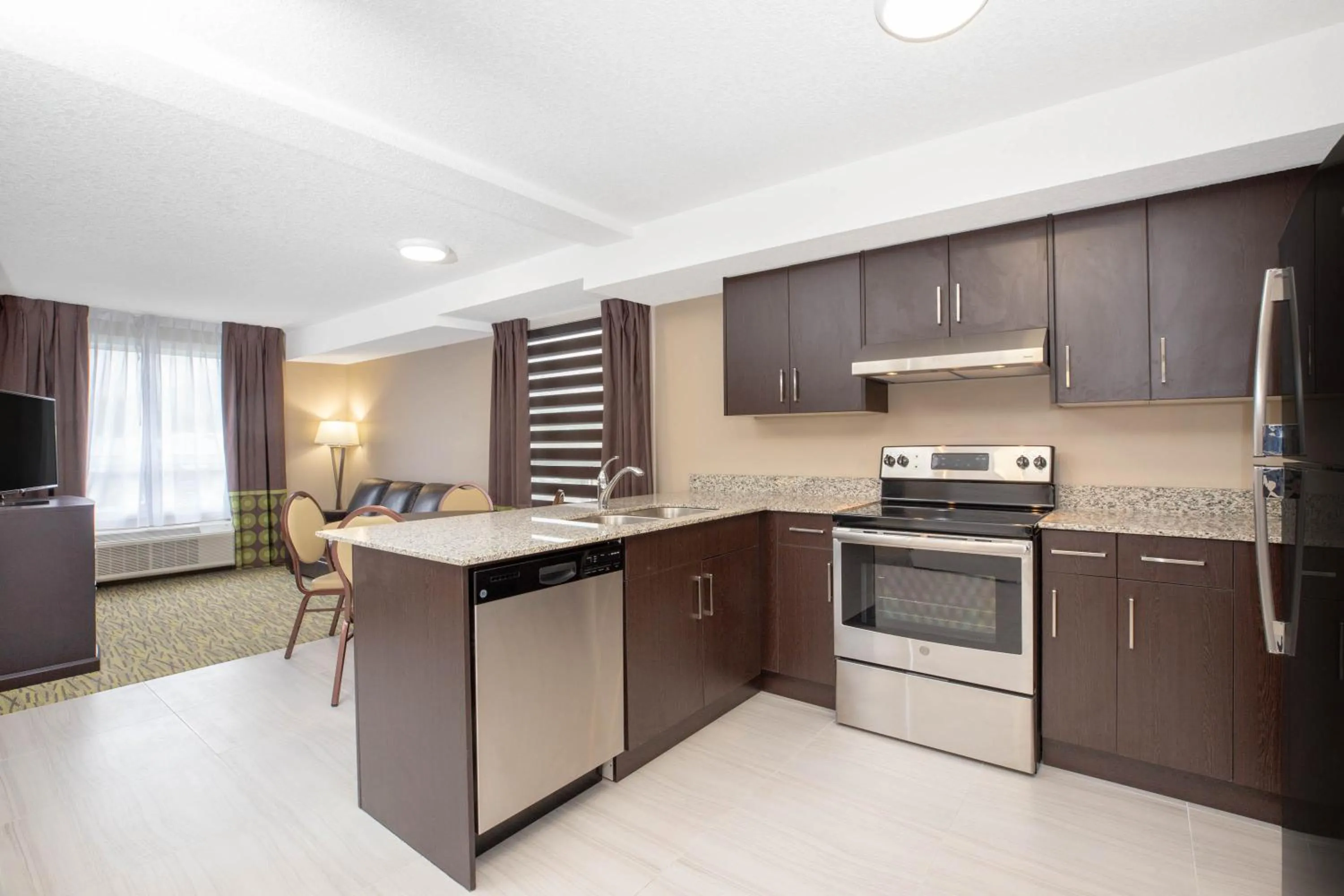 Kitchen or kitchenette in Super 8 by Wyndham Canmore