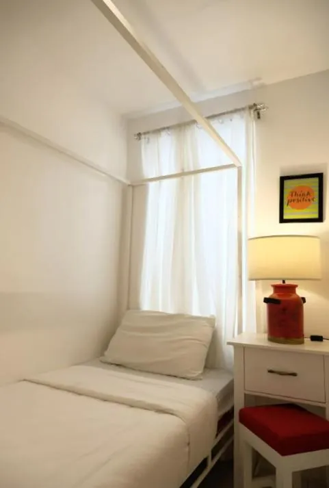 Bed in La Bella Boutique Hotel