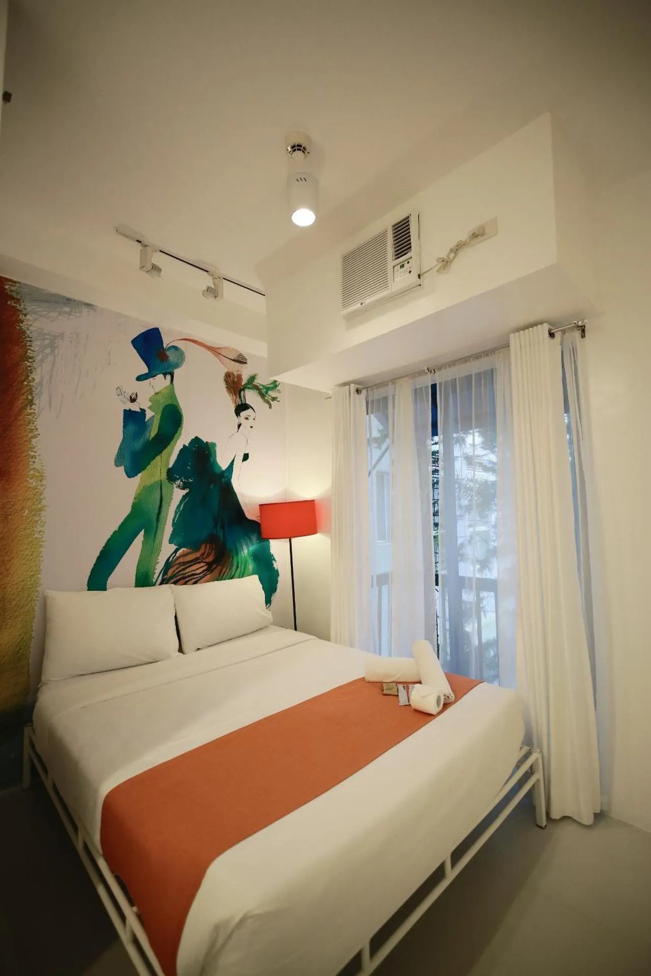 Bed in La Bella Boutique Hotel