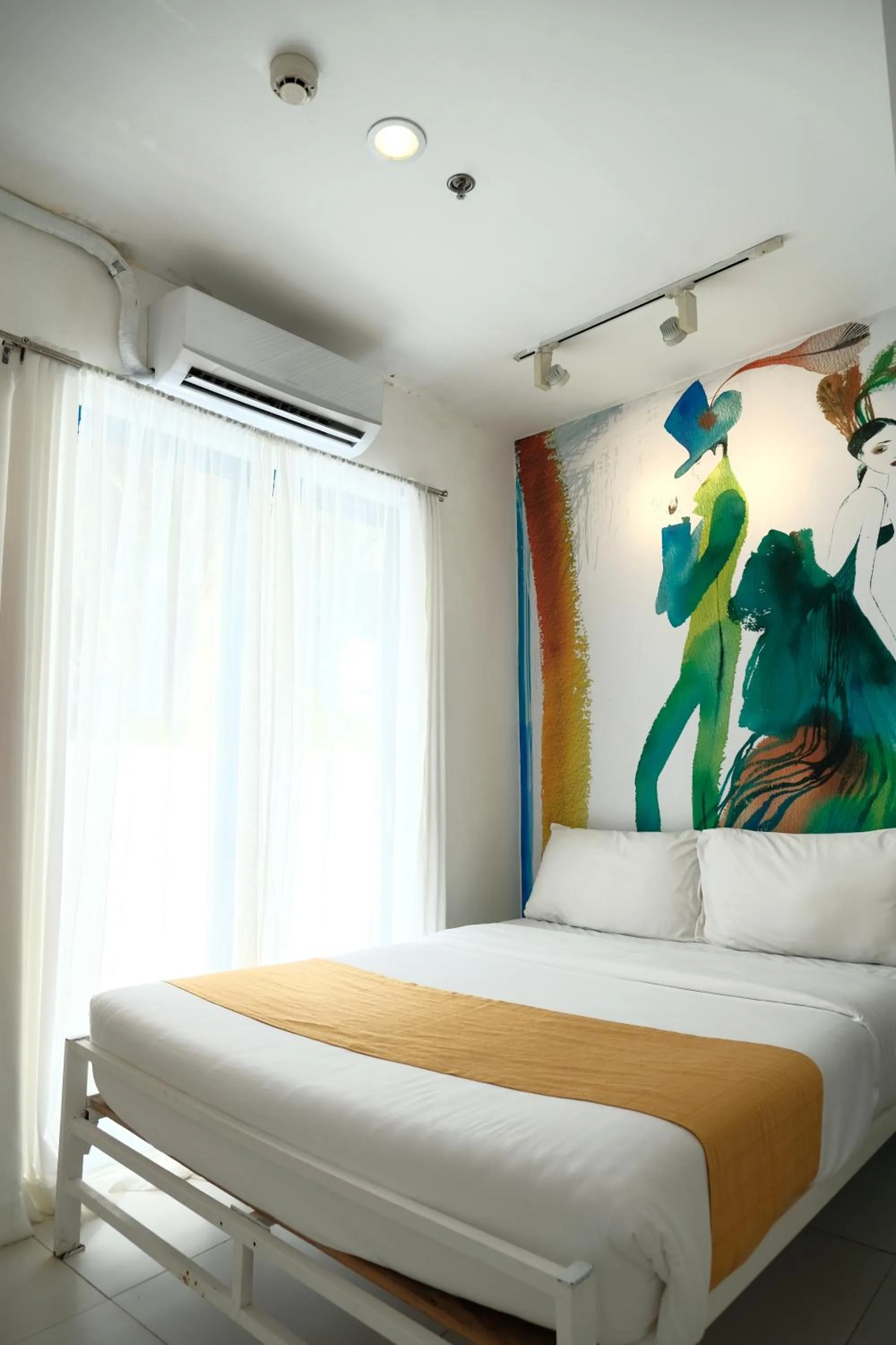 Bed in La Bella Boutique Hotel