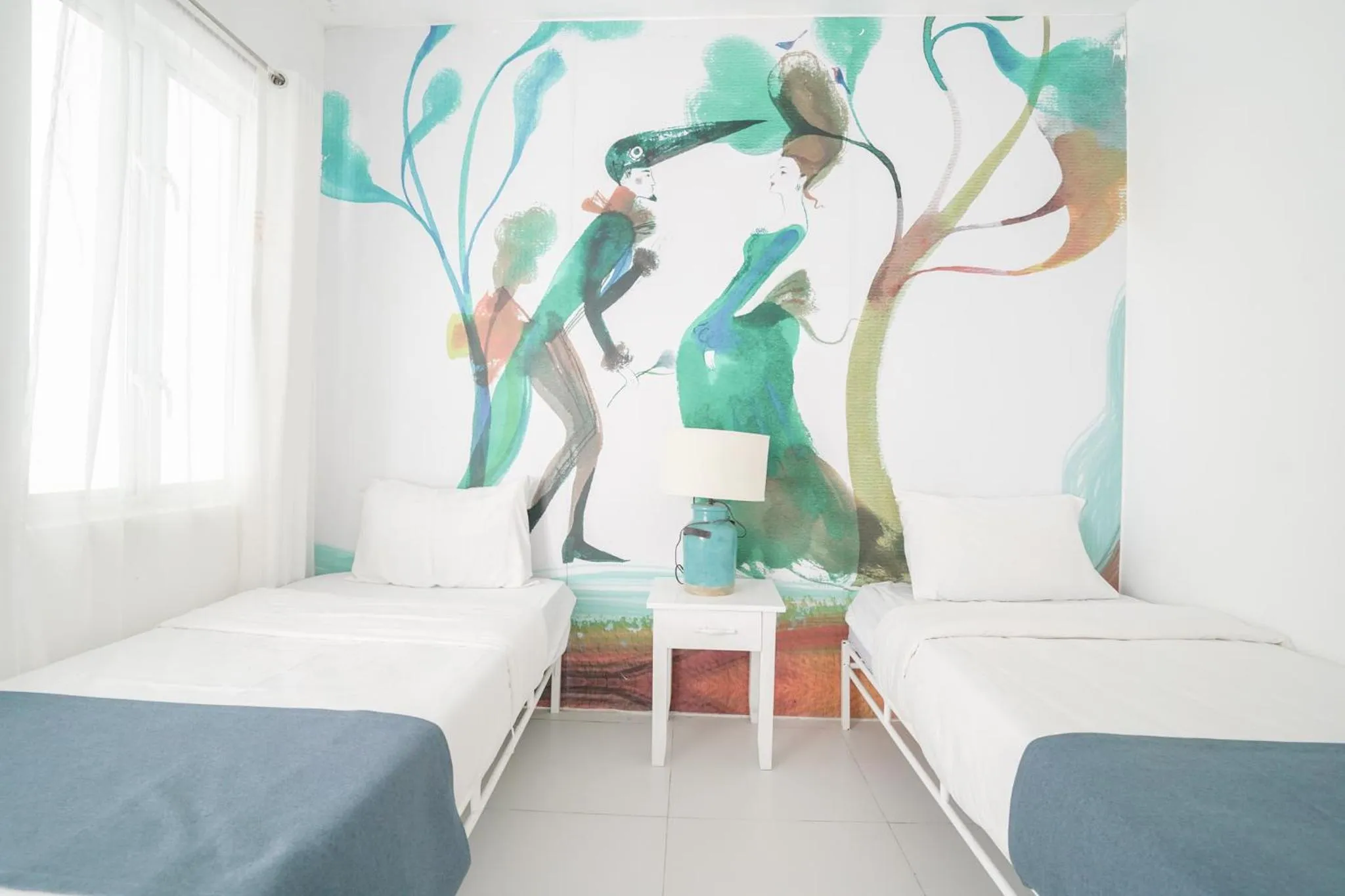 Bed in La Bella Boutique Hotel