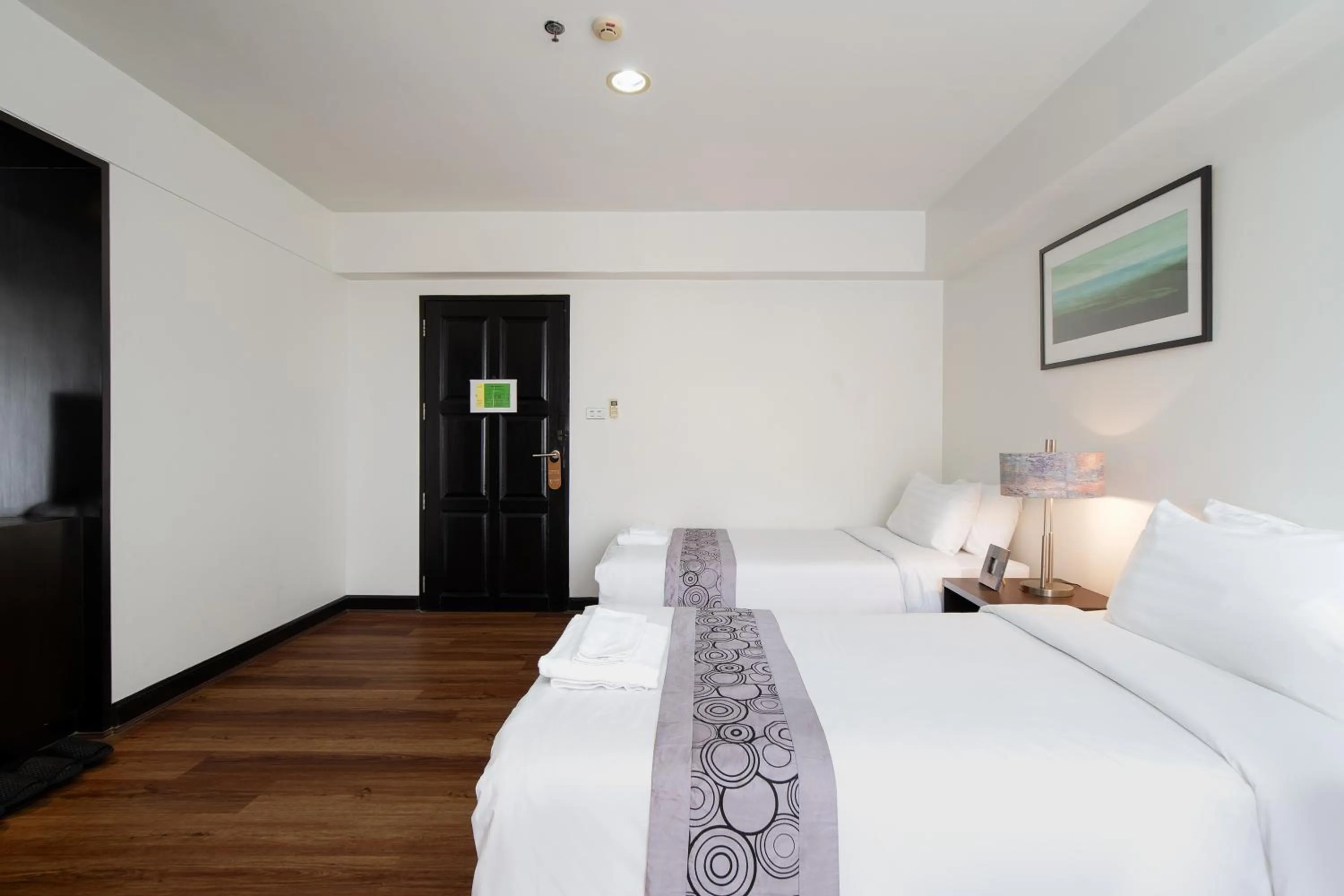 Bed in Lily Hotel Bangkok