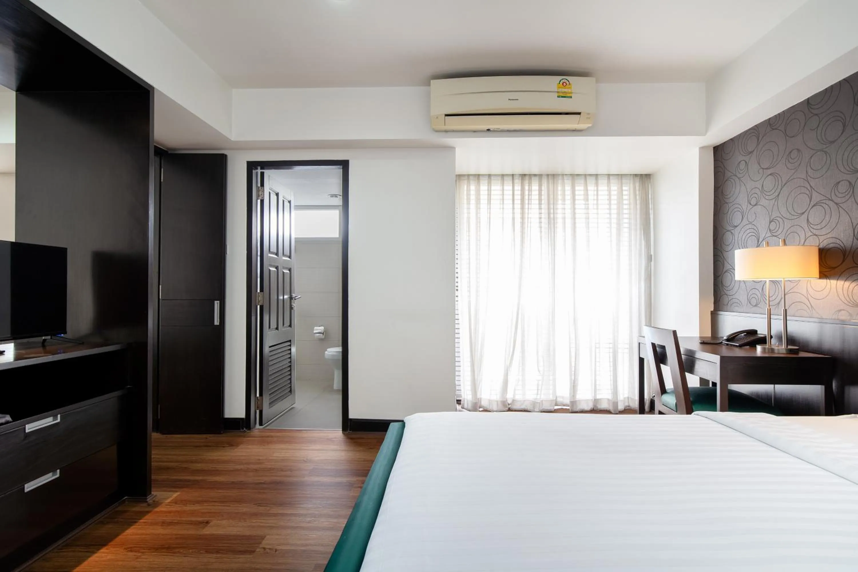 Bed in Lily Hotel Bangkok