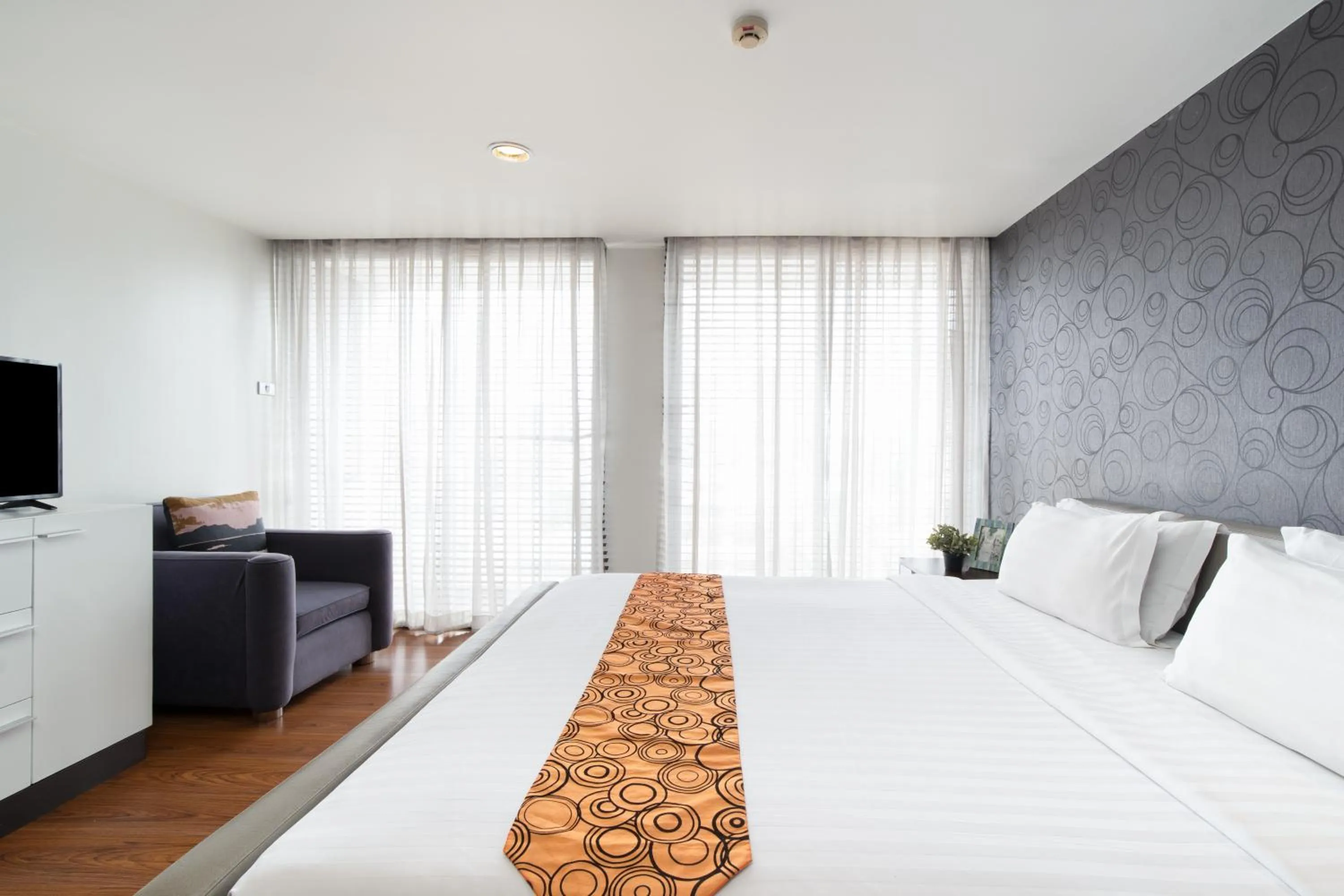 Bed in Lily Hotel Bangkok