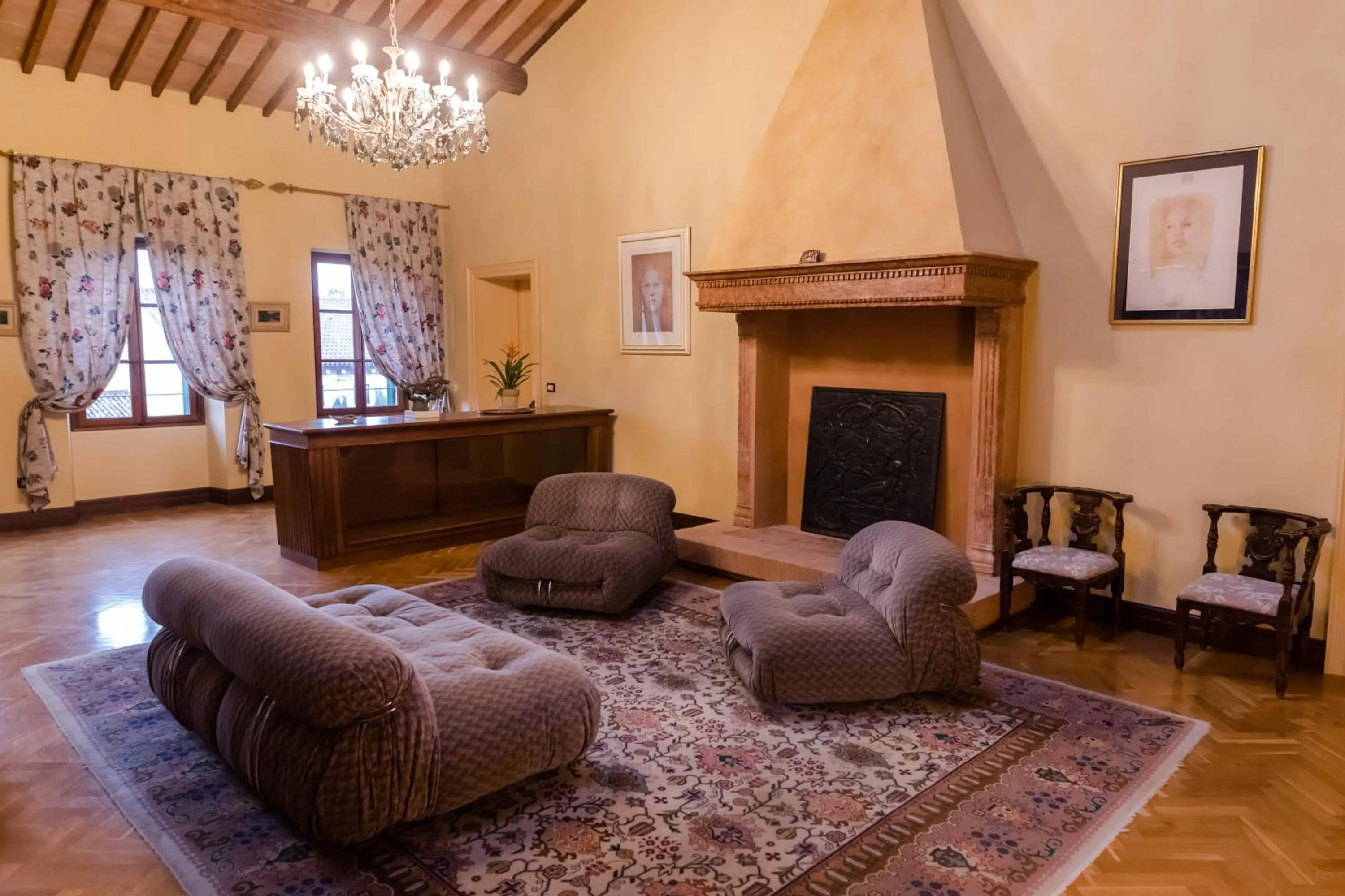 Communal lounge/ TV room in Villa Nichesola