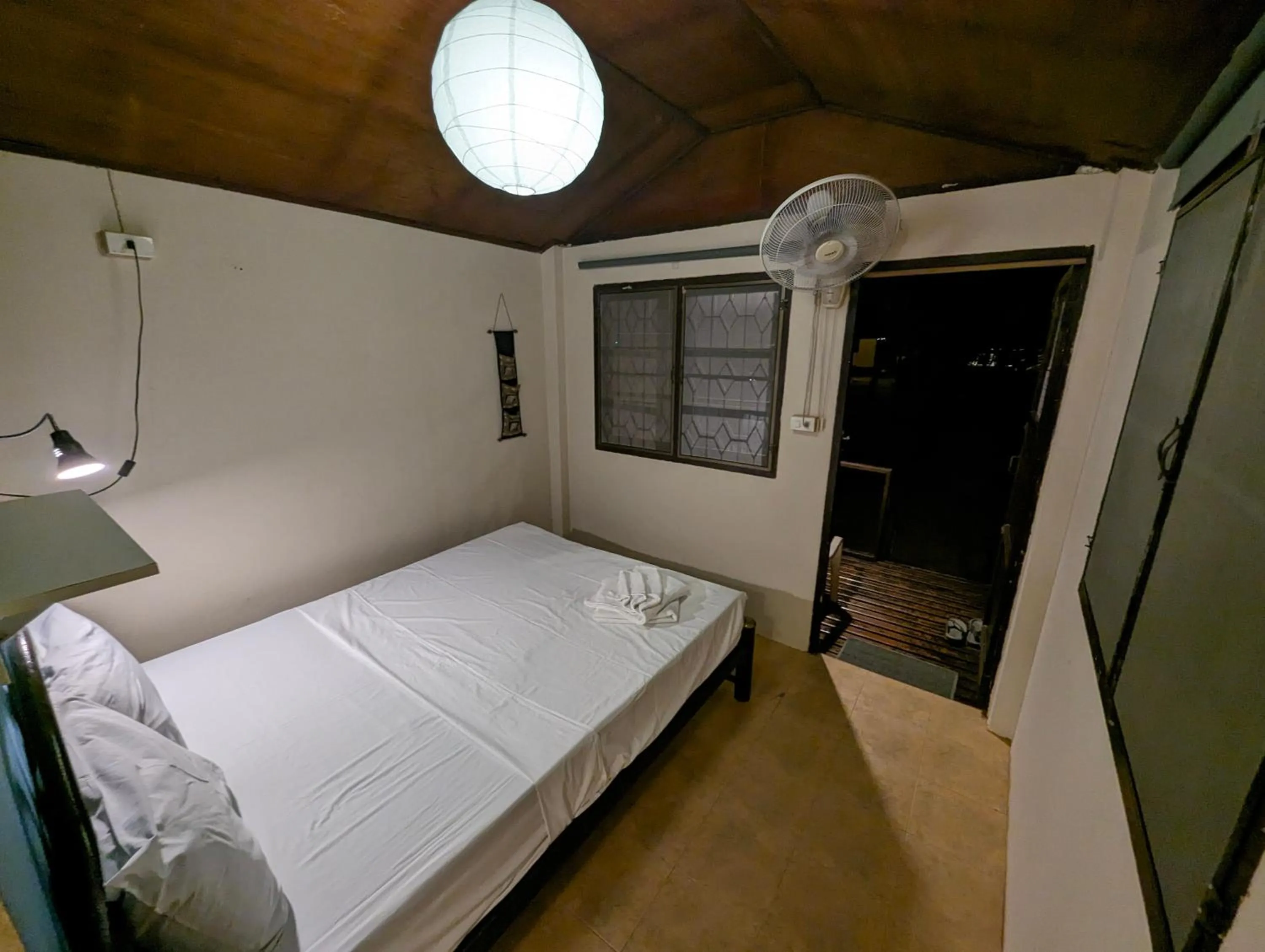 Bed in Moonhut Bungalows