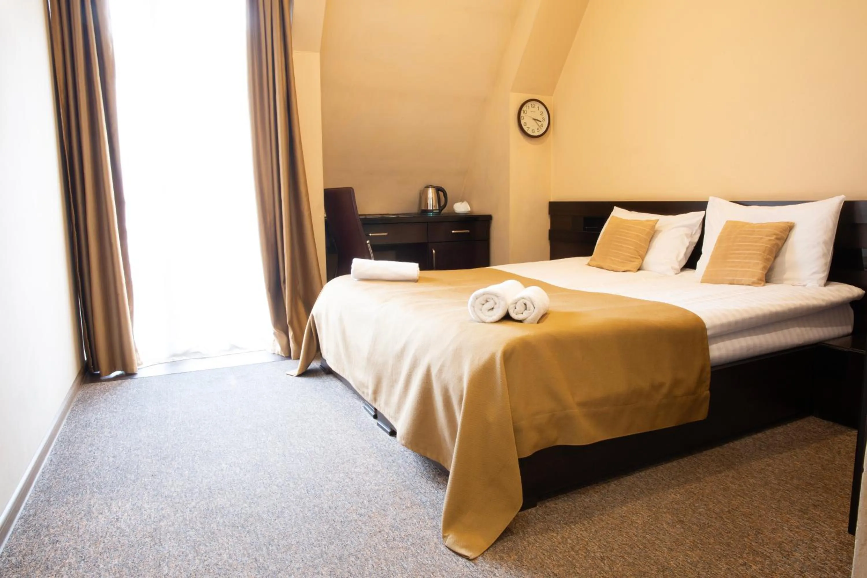 Bed in Hotel Diplomat