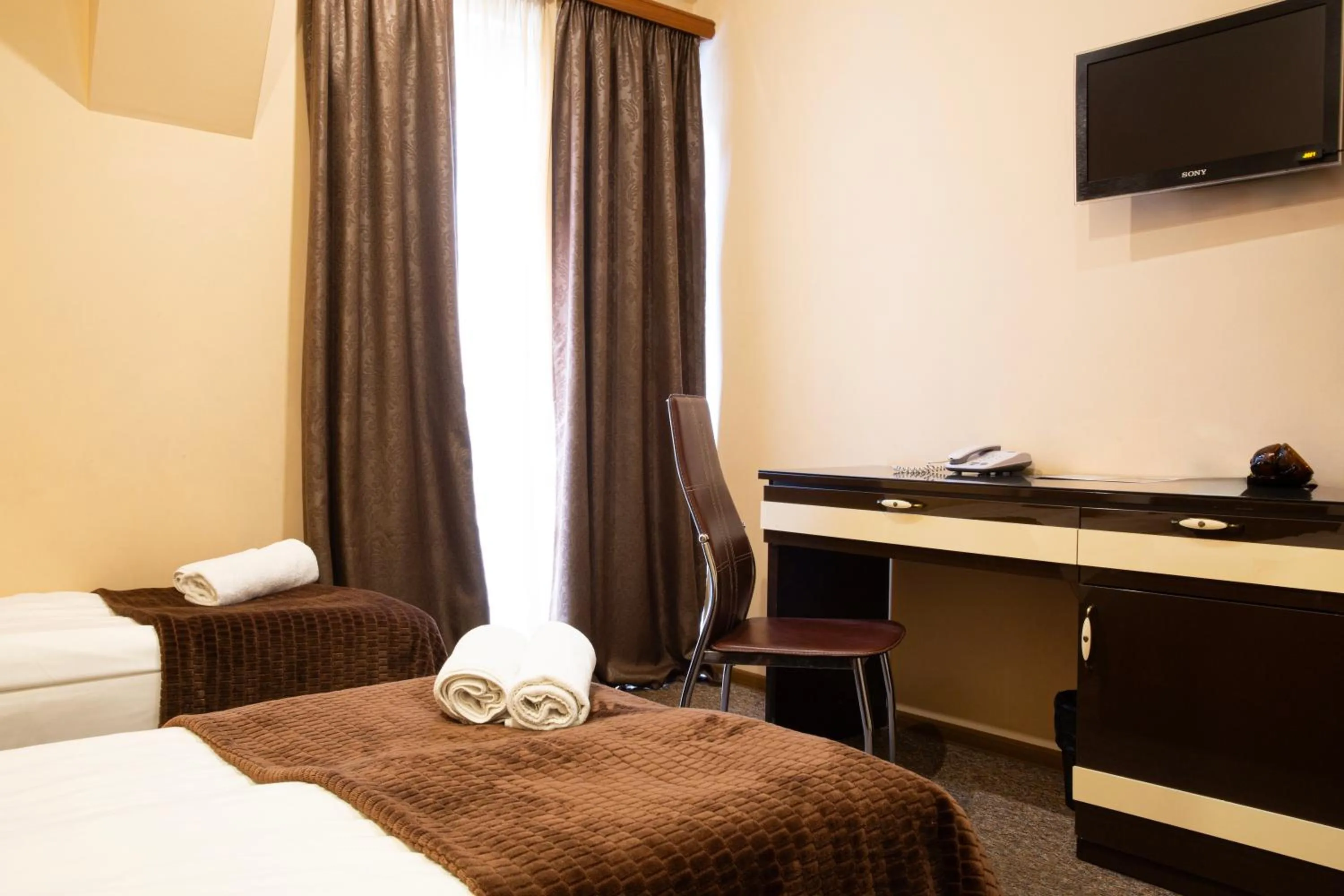 Bed in Hotel Diplomat