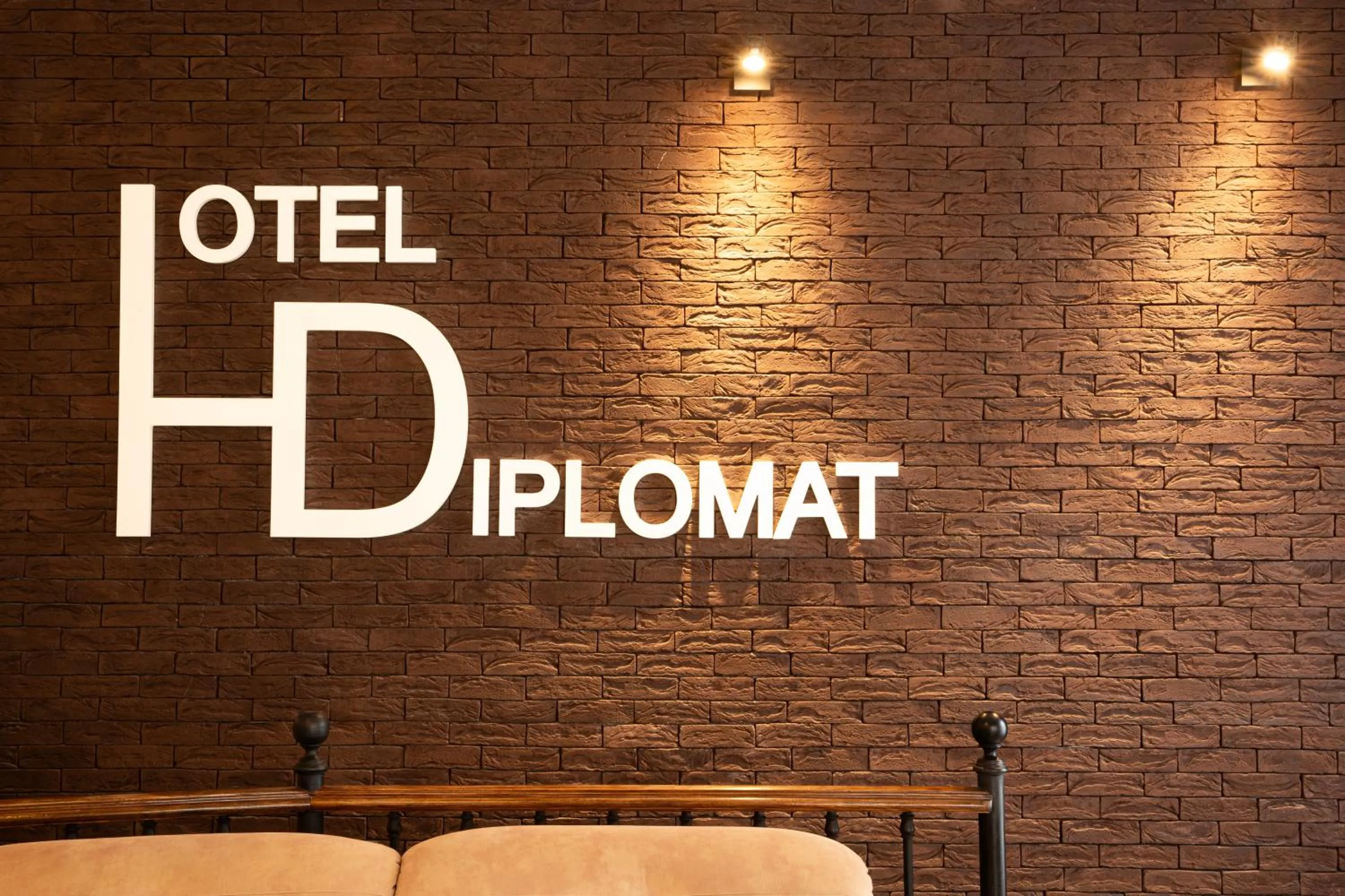 Property logo or sign in Hotel Diplomat