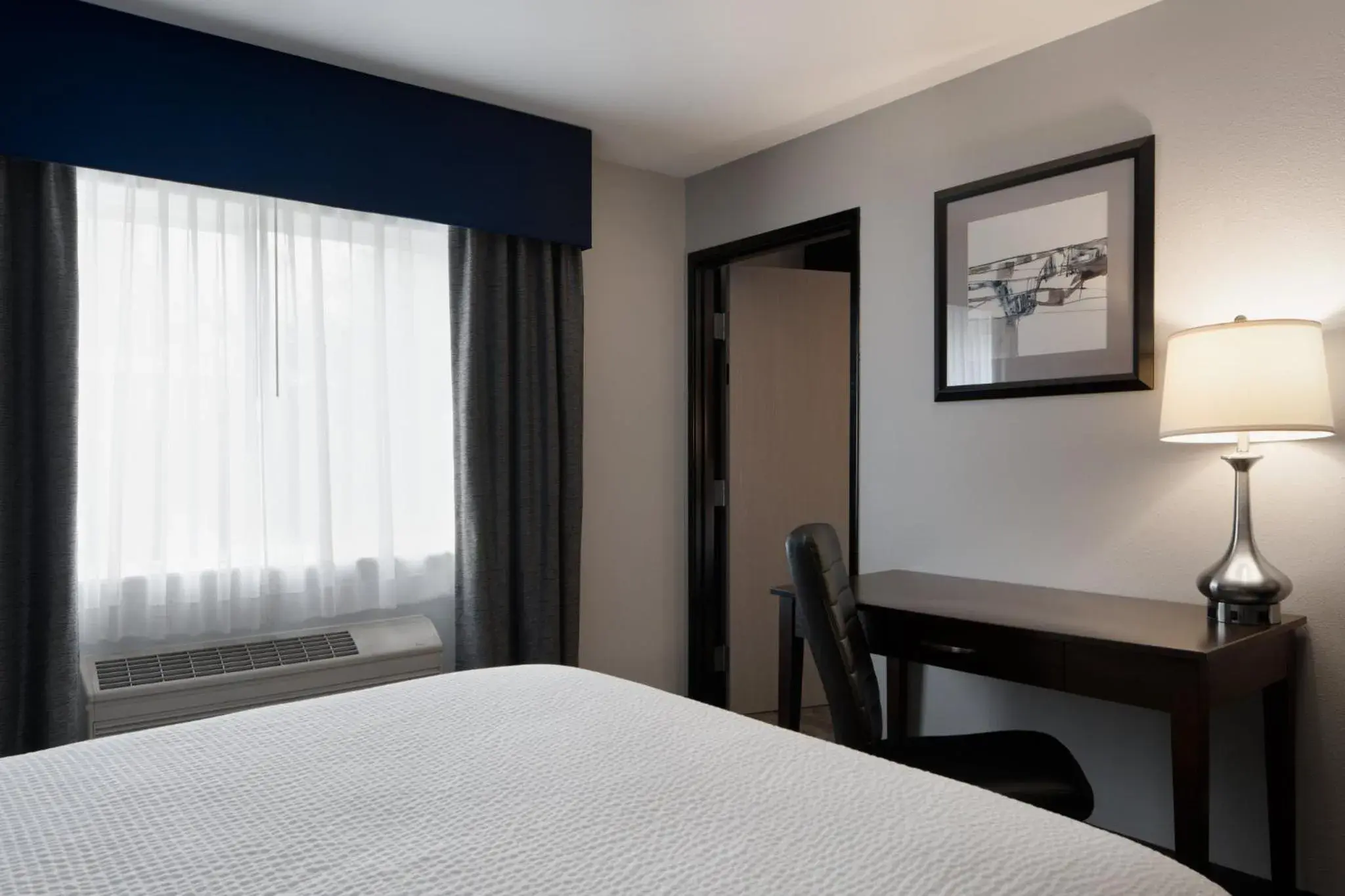 One-Bedroom Suite with Three Queen Beds in Red Lion Inn & Suites Auburn/Seattle One-Bedroom Suite with Three Queen Beds in Red Lion Inn & Suites Auburn/Seattle