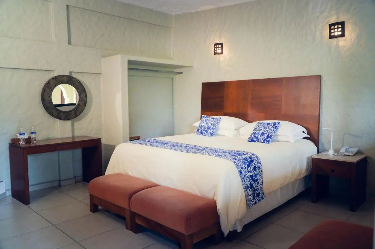 Bed in Hotel El Rebozo