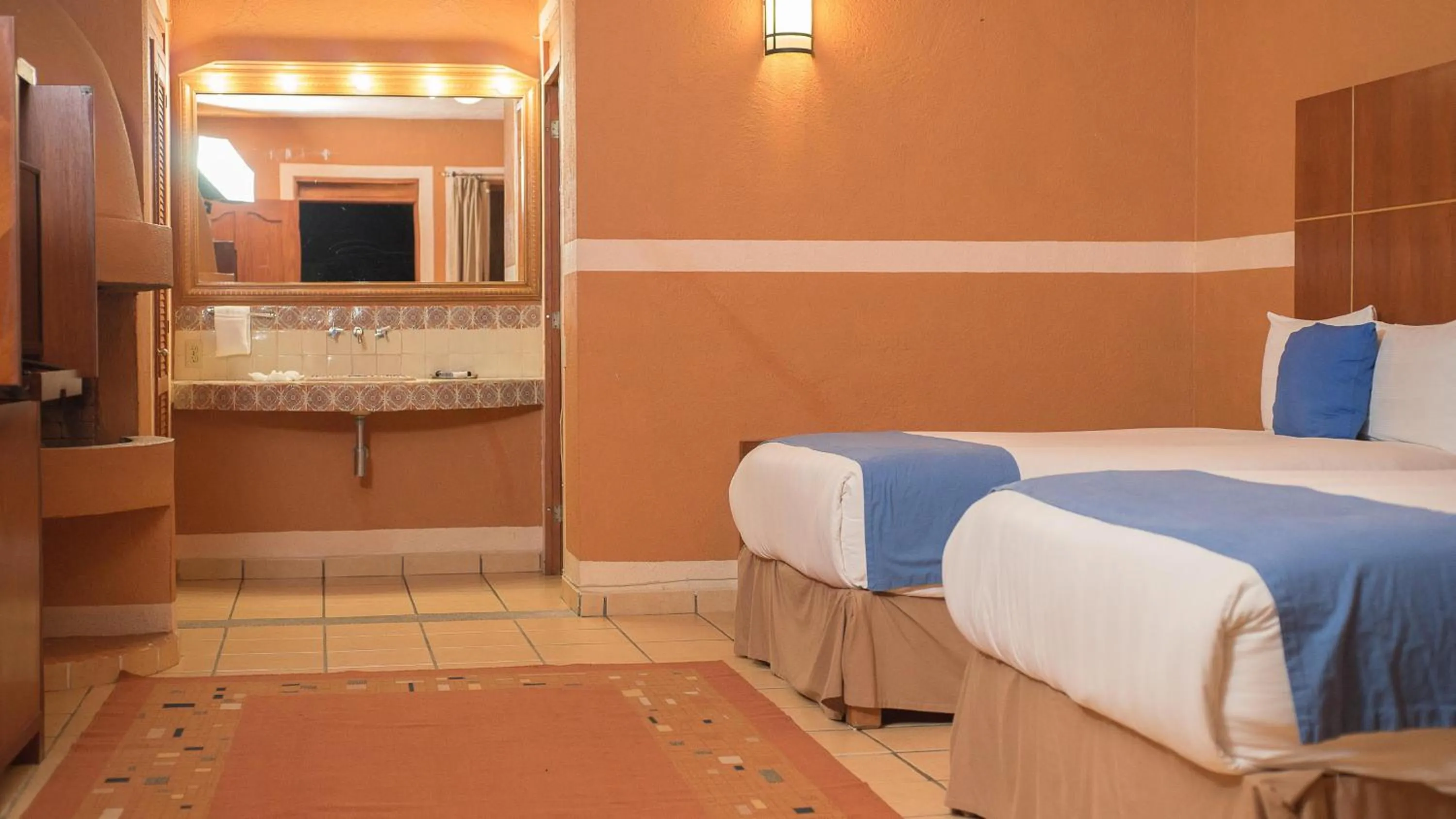 Bed in Hotel El Rebozo