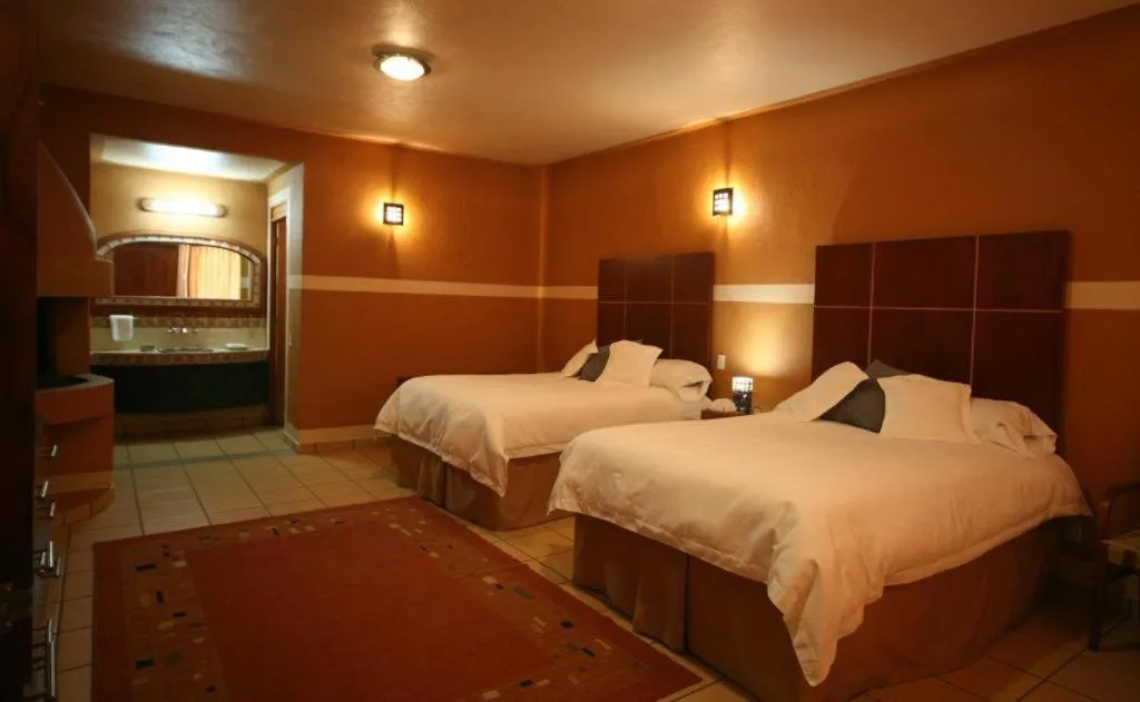 Bed in Hotel El Rebozo