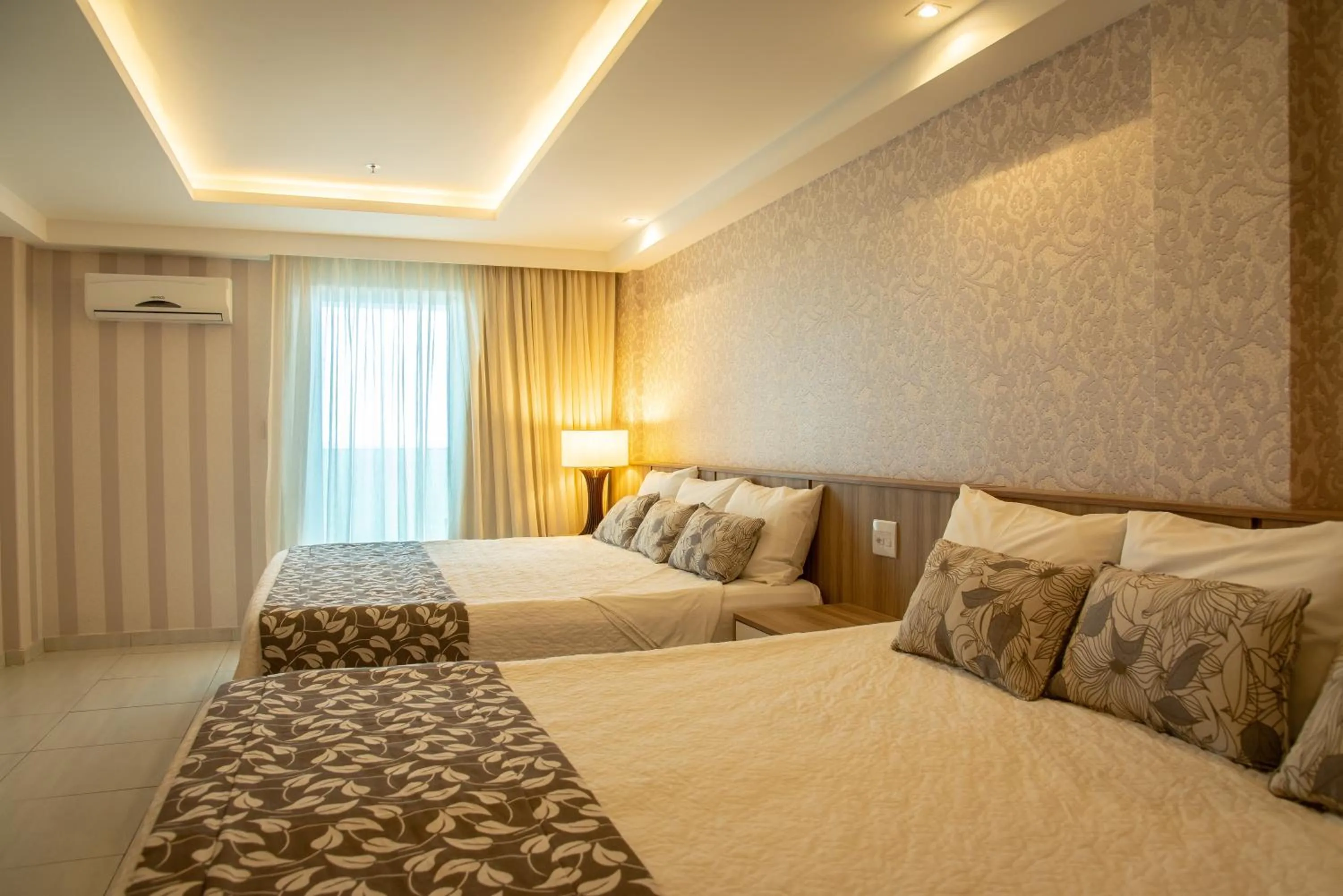 Bed in Paradiso Macae Hotel