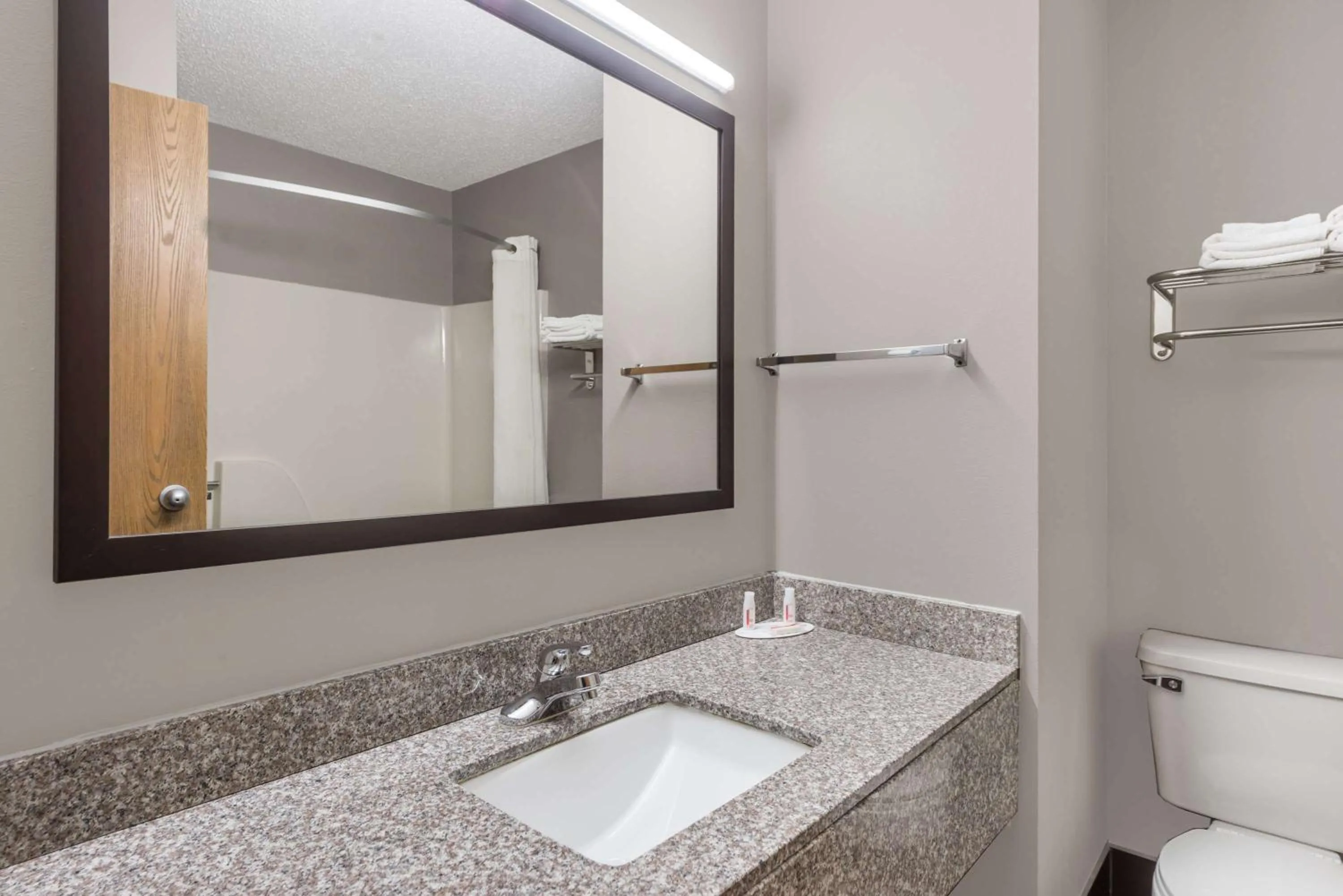 Bathroom in Super 8 by Wyndham West Plains