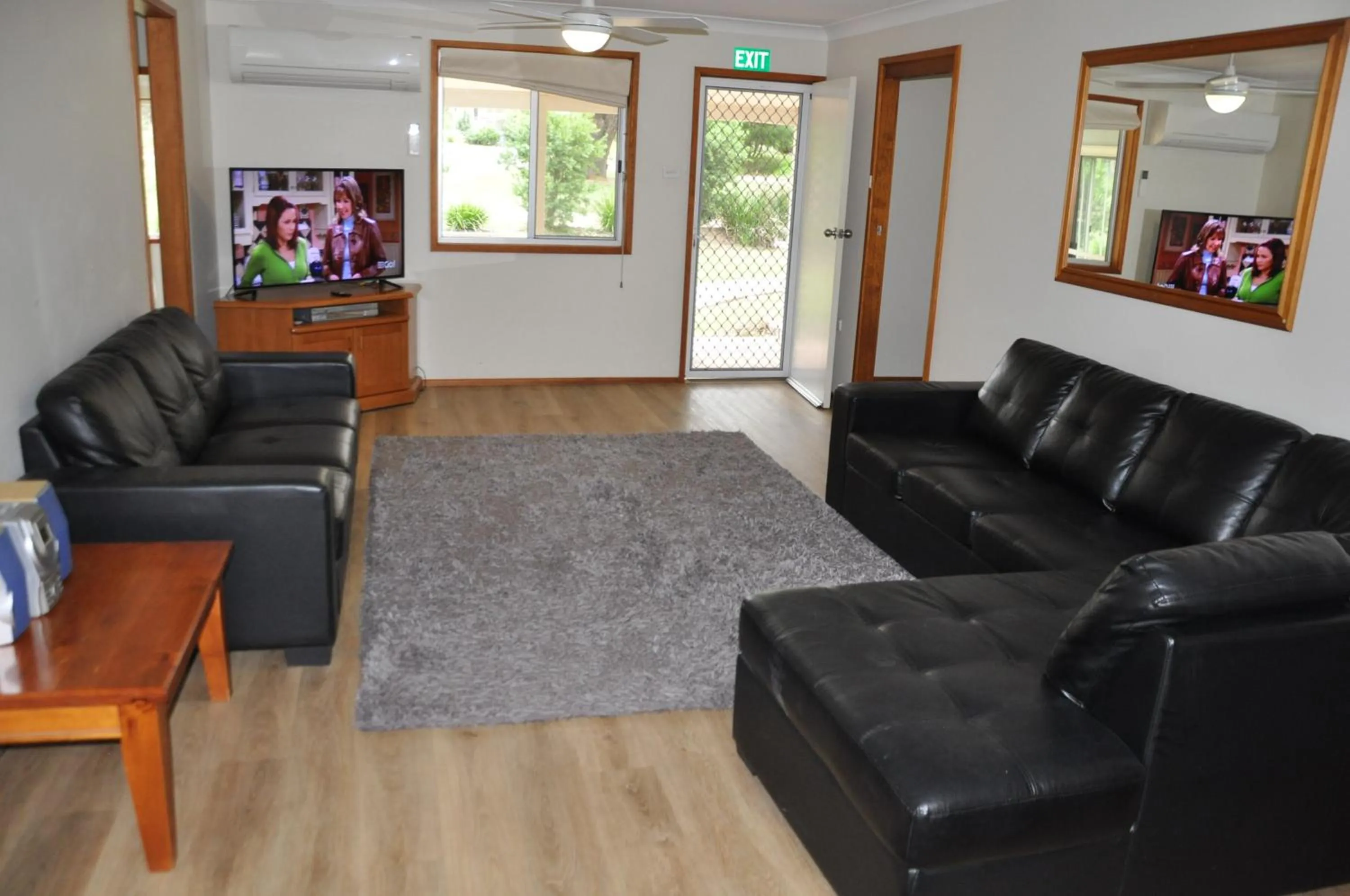 Communal lounge/ TV room in Pokolbin Village Estate