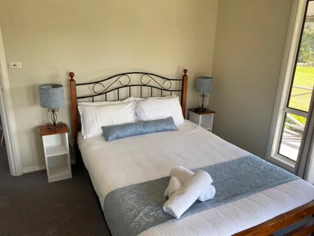 Bed in Twin Trees Country Cottages